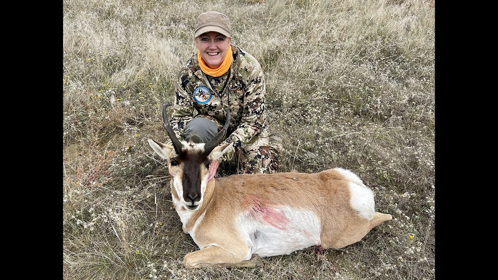 Becky Rodriguez with the pronghorn she bagged.