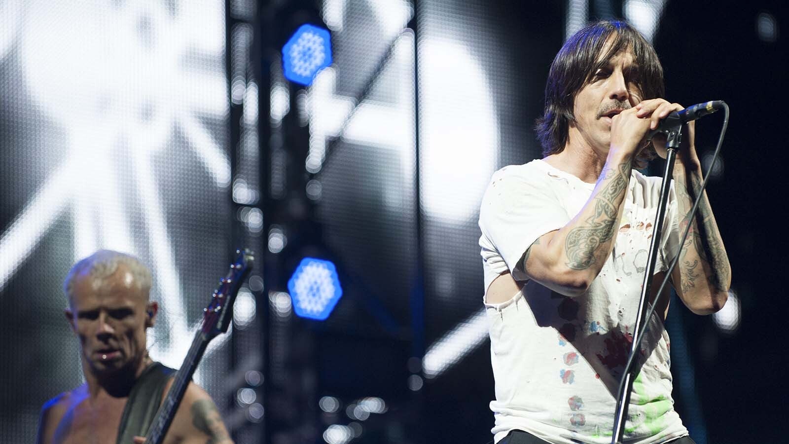 Red Hot Chili Peppers frontman Anthony Kiedis performs on stage.