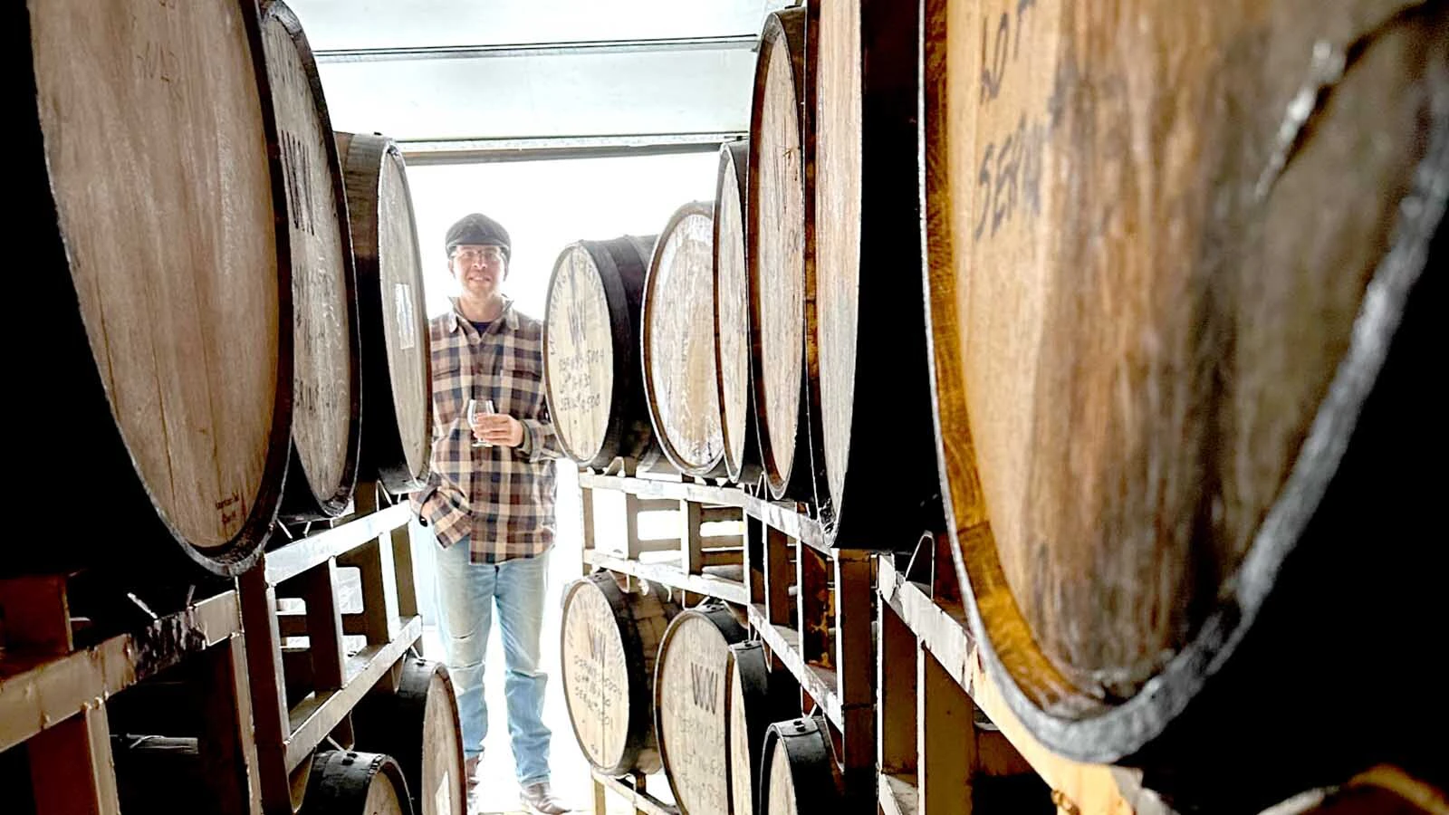 Ian McGregor with casks of aaging cider.