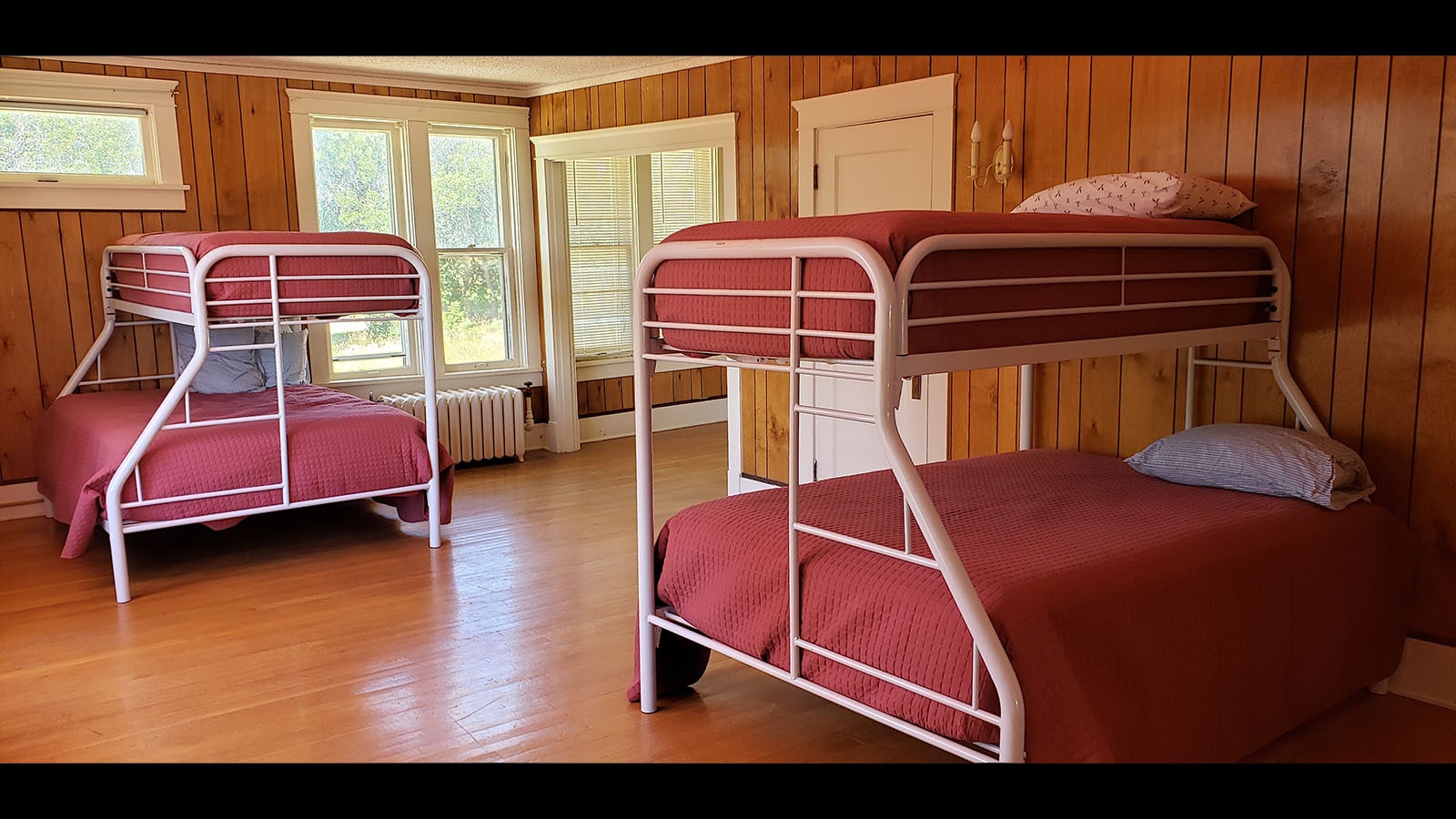 The upstairs bedrooms all have bunk beds in them for now and are serving as dormitory space for workshops.