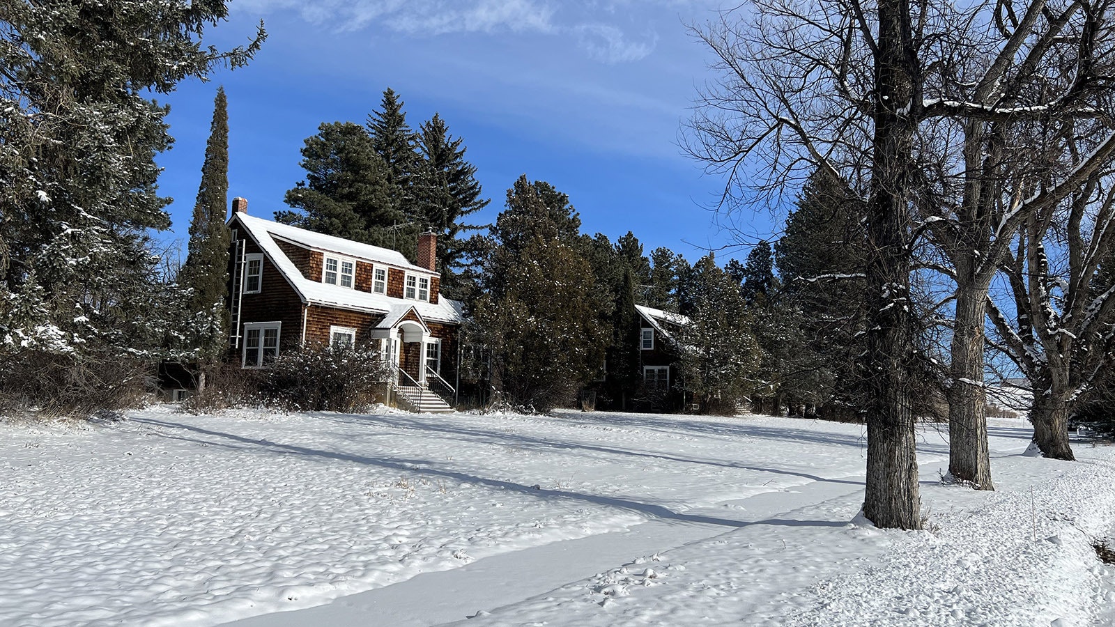 A row of houses on the grounds of the High Plains Arboretum are some of the oldest homes in Cheyenne.