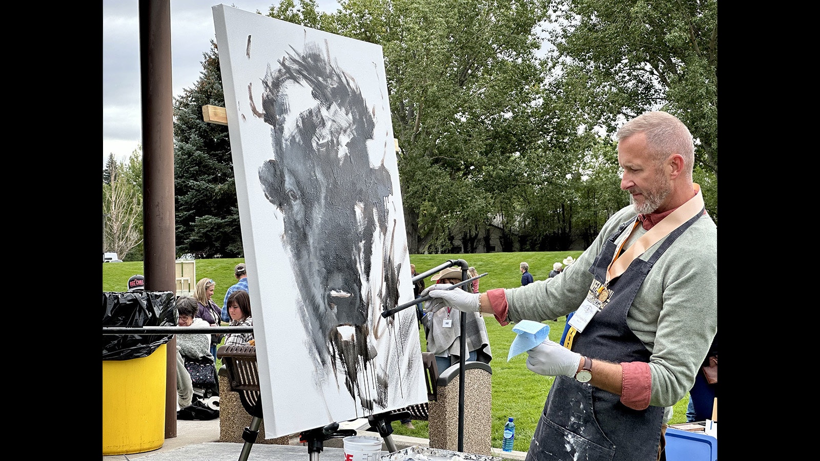 David Frederick Riley paints "American Dream" during the 42nd Buffalo Bill Art Show and Sale Quick Draw. The painting won the People's Choice Award for the Quick Draw and was the highest-selling piece at the morning's live auction.