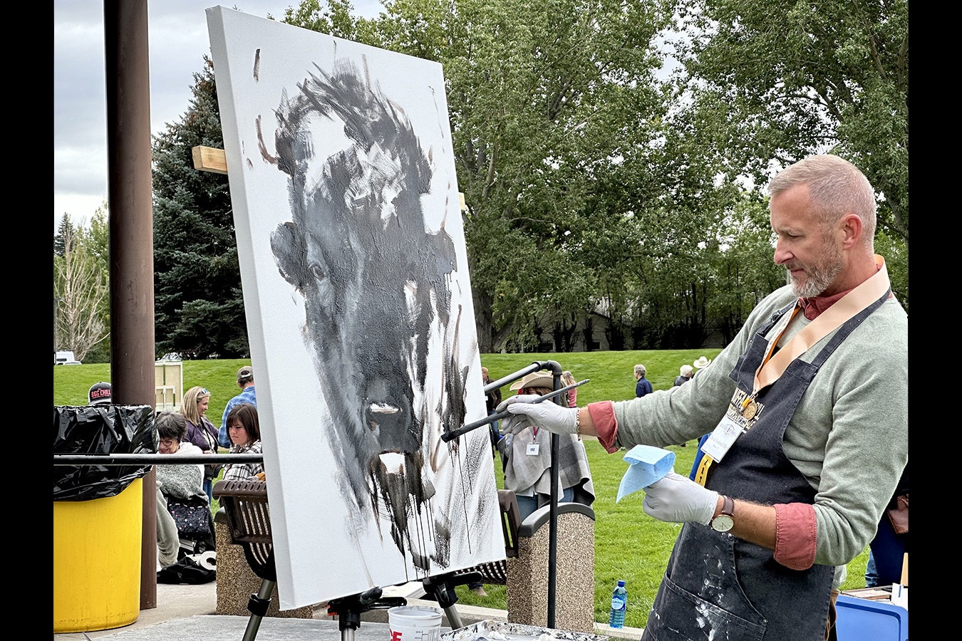David Frederick Riley paints "American Dream" during the 42nd Buffalo Bill Art Show and Sale Quick Draw. The painting won the People's Choice Award for the Quick Draw and was the highest-selling piece at the morning's live auction.