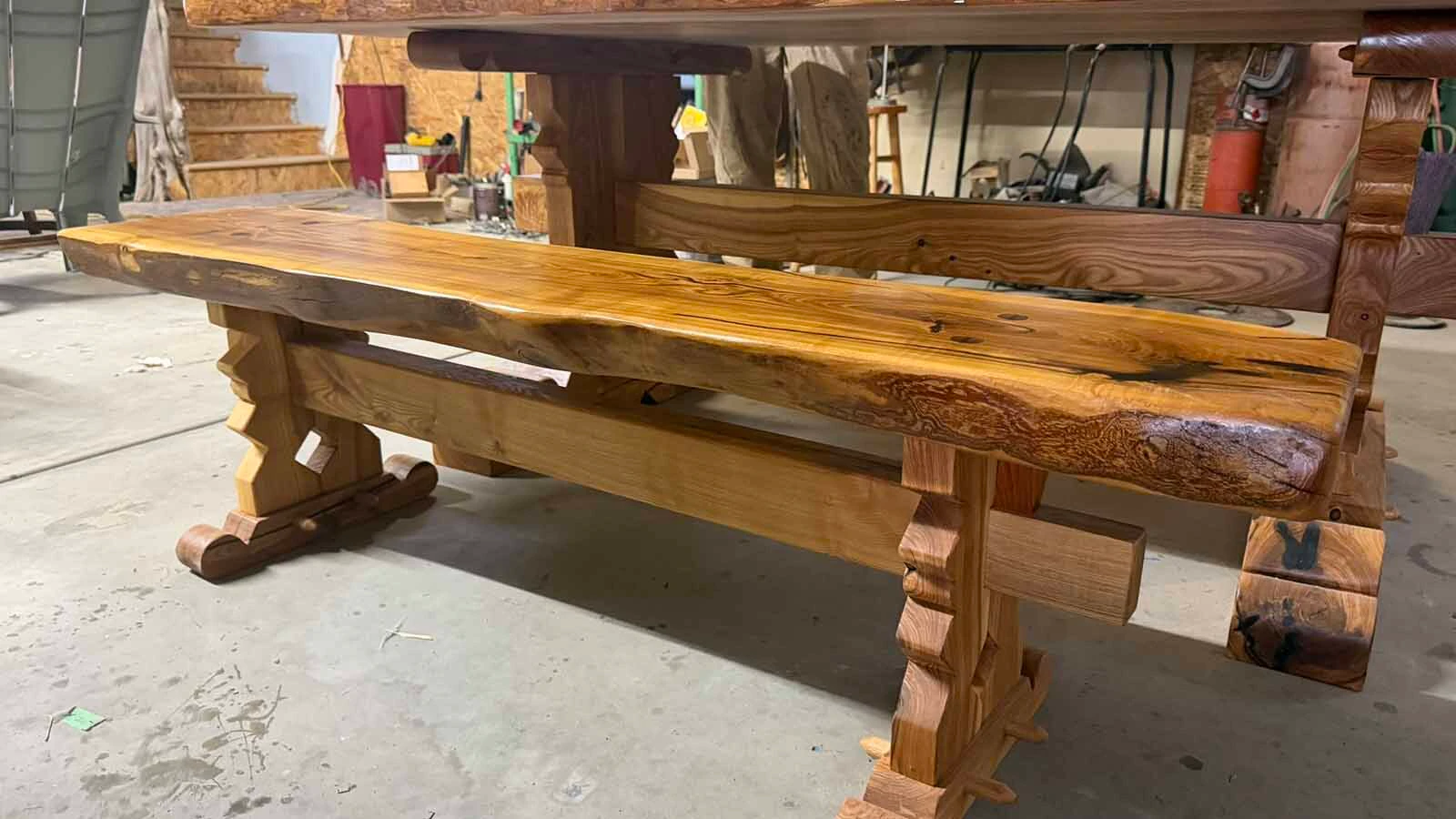 An ancient ash wood tree was mistakenly cut down in its prime at the Washakie County Courthouse in Worland in 1999. Groundskeeper Heather Shryack rescued the wood and nearly 30 years later, her husband, Terry, and visual artist Calvin "Cal" Fulfer have made the wood into a stunning 600-pound table, mixing medieval design with modern art.