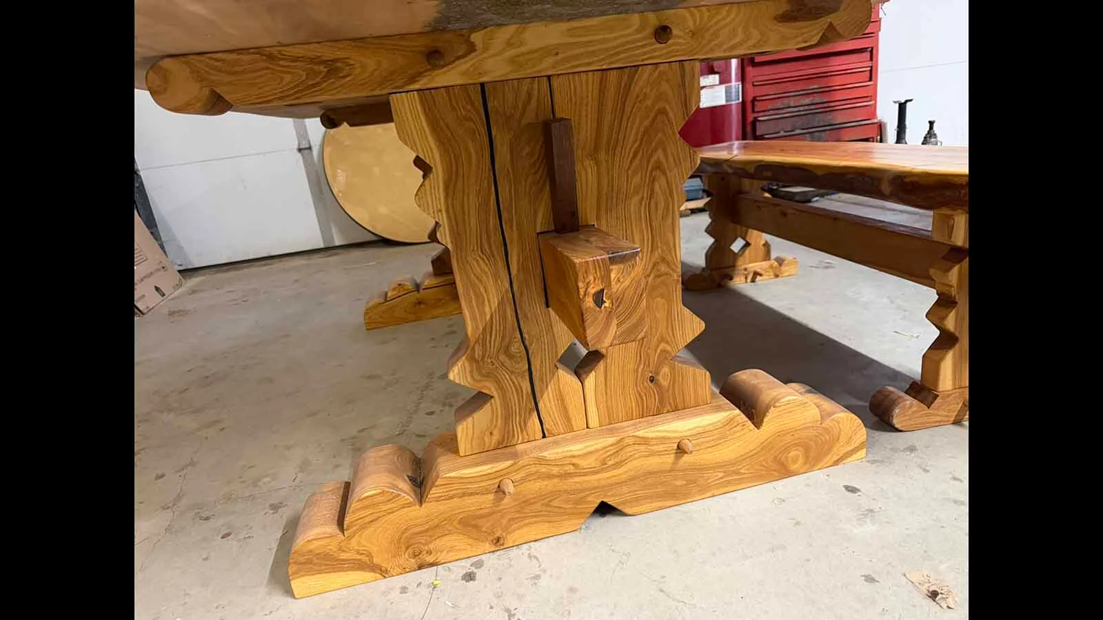 An ancient ash wood tree was mistakenly cut down in its prime at the Washakie County Courthouse in Worland in 1999. Groundskeeper Heather Shryack rescued the wood and nearly 30 years later, her husband, Terry, and visual artist Calvin "Cal" Fulfer have made the wood into a stunning 600-pound table, mixing medieval design with modern art.
