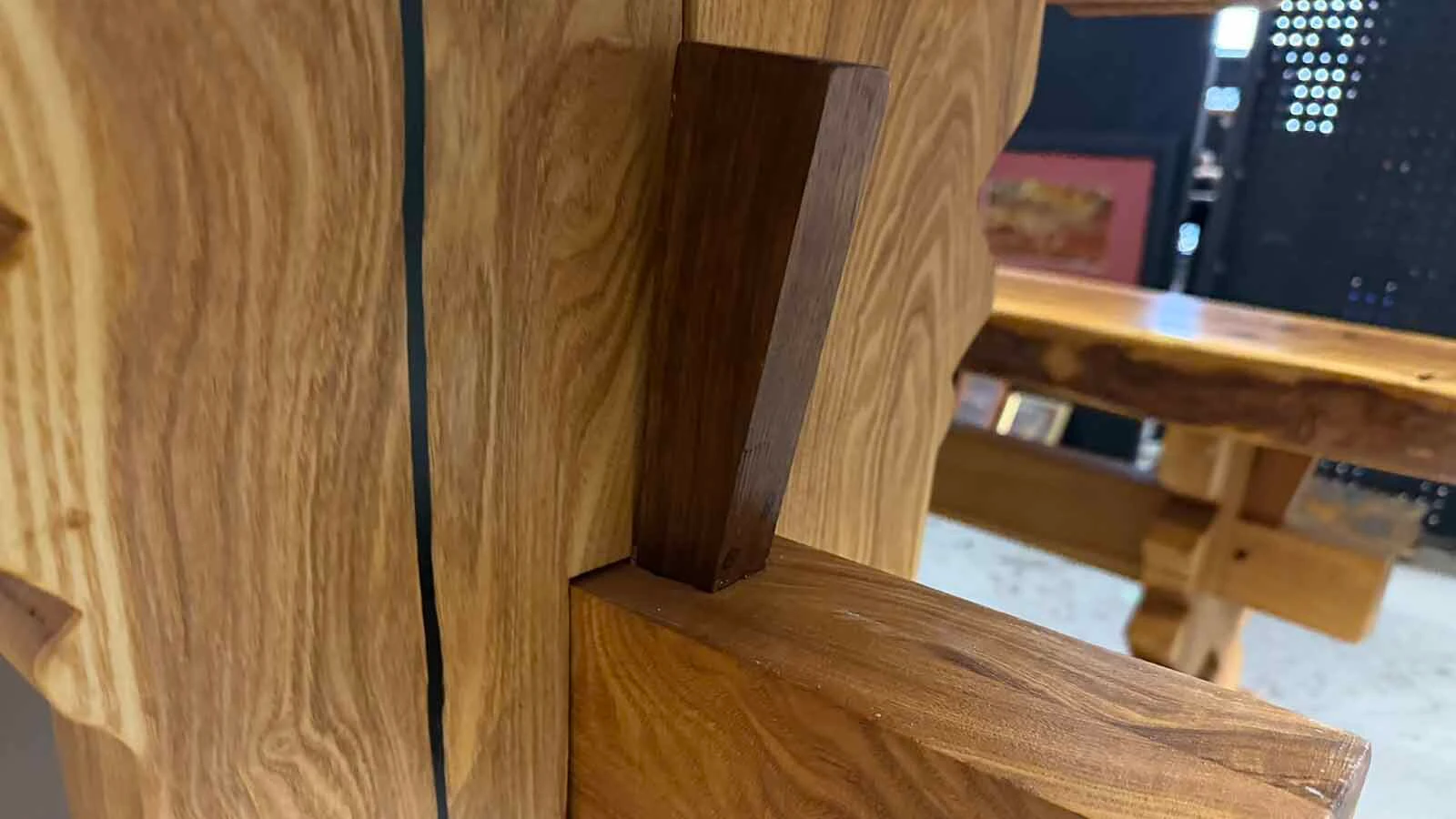 An ancient ash wood tree was mistakenly cut down in its prime at the Washakie County Courthouse in Worland in 1999. Groundskeeper Heather Shryack rescued the wood and nearly 30 years later, her husband, Terry, and visual artist Calvin "Cal" Fulfer have made the wood into a stunning 600-pound table, mixing medieval design with modern art.