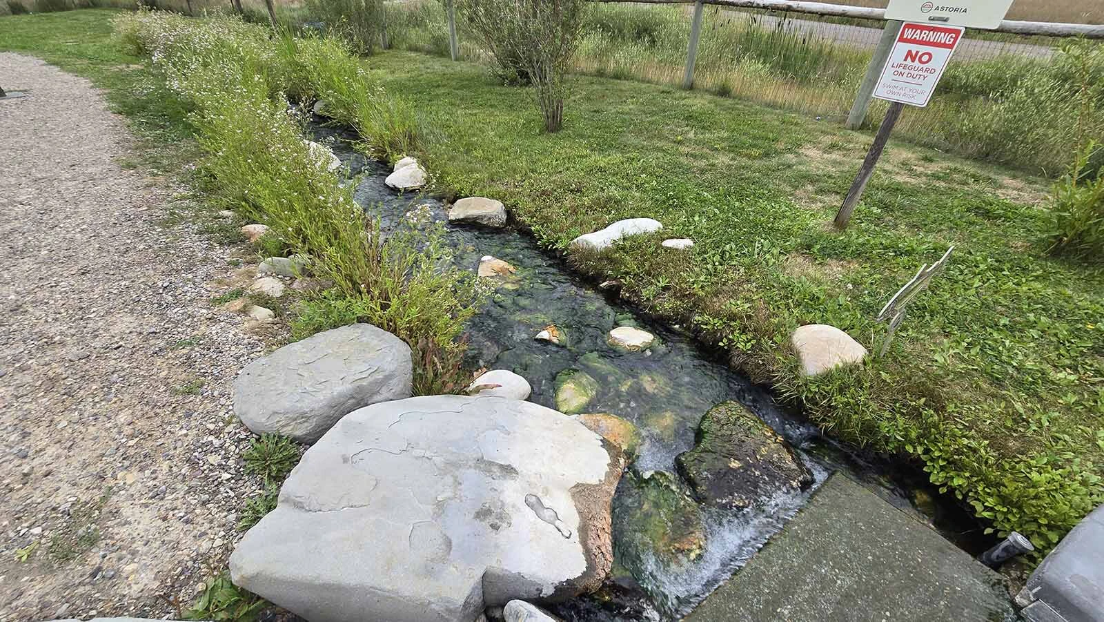 A hot spring stream runs through the soaking pools at Astoria Hot Spring Park.