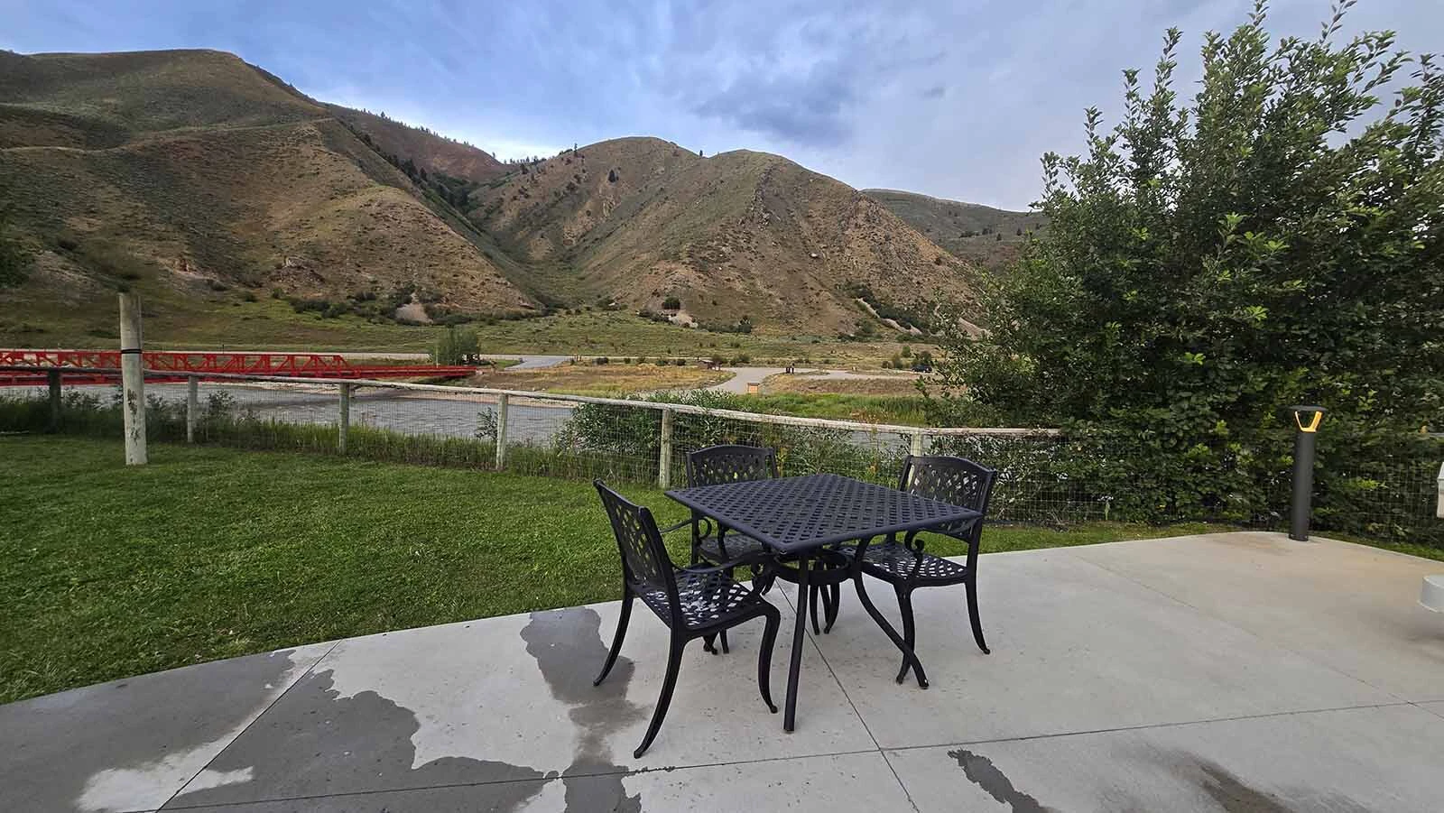 A picnic table at Astoria Hot Springs Park, which offers six hot spring mineral pools for soaking.
