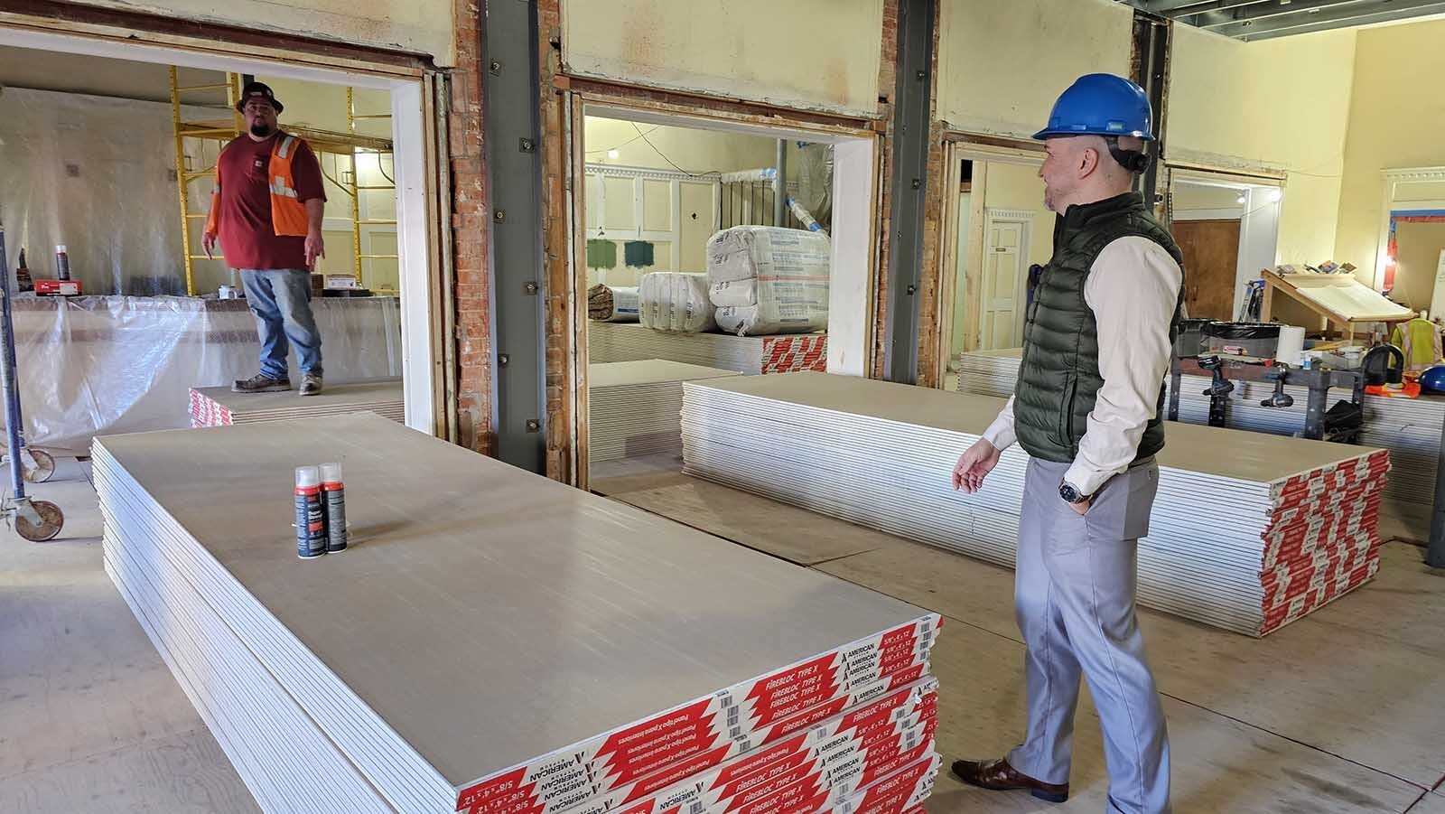 Travis Kirchhefer, right, is president of the board for Cheyenne Little Theatre Players. He's hopeful that the facility will be ready in time for Valentine’s Day.