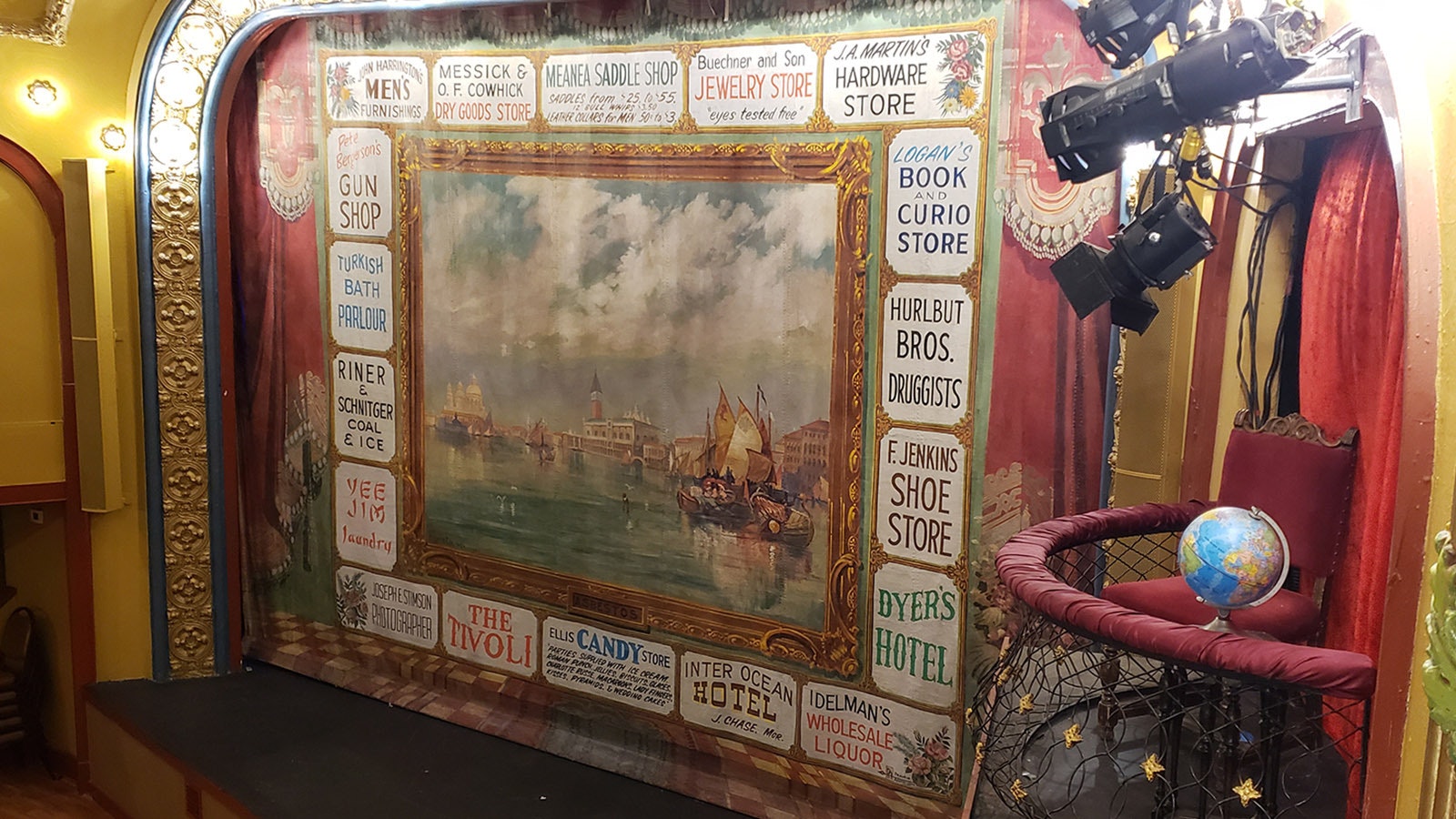 The vintage 1907-08 asbestos curtain was restored when Cheyenne's Capitol dome was restored by the same team. It cost $30,000 to restore. The scene is from Venice. The businesses around it were the sponsors of the time. Of them, only the Tivoli still survives.