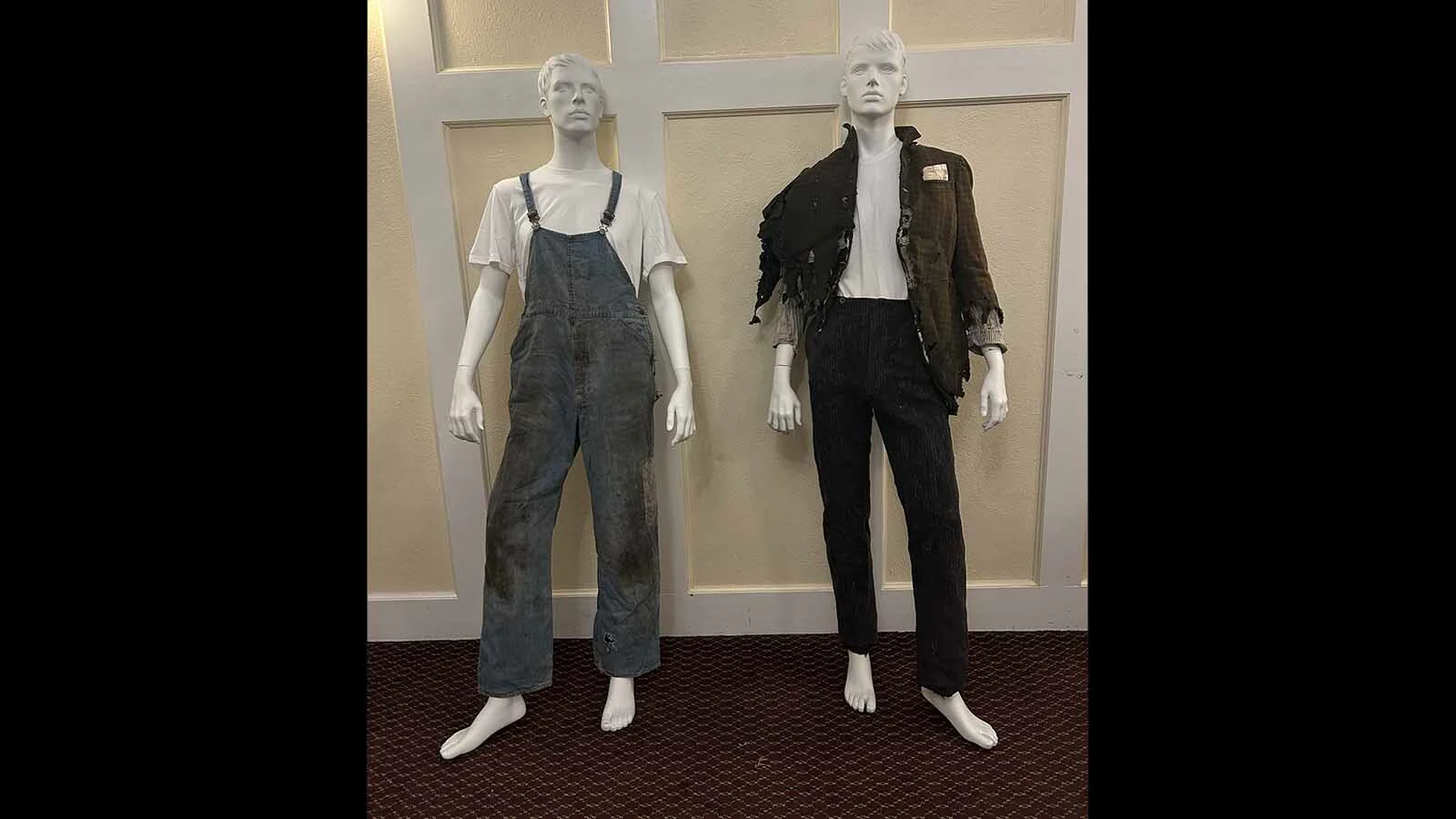 These hand-sewen clothing items were found hidden behind a ceiling tile in the attic at the Atlas.