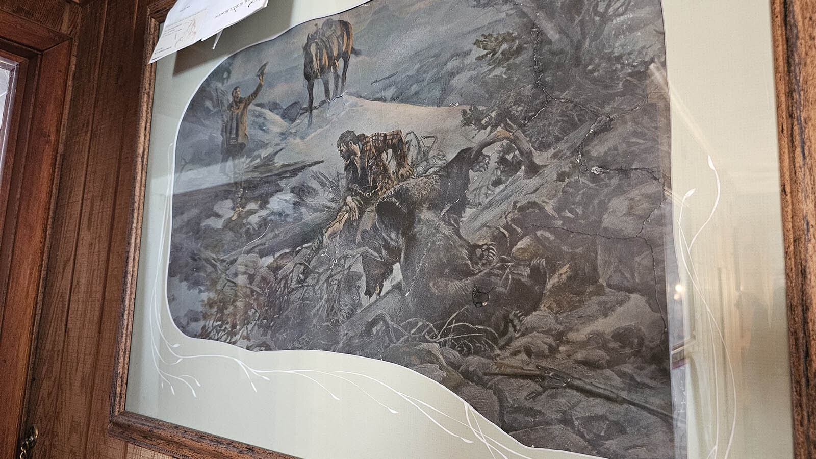 This Charles Russell print was discovered behind sheetrock and layers of wallpaper and newspaper. Dave Stephens believes it could be an original.