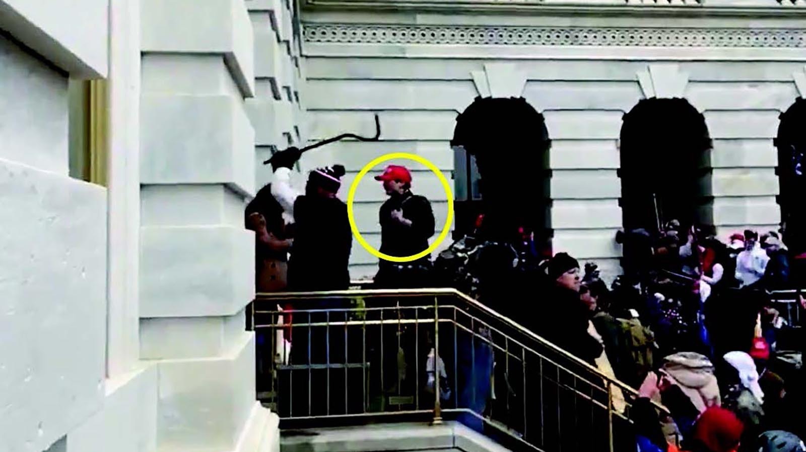 Laramie, Wyoming, resident August Raymond Garcia haa been indicted for his alleged role in the Jan. 6, 2021, riot at the U.S. Capitol. A 15-page indictment dated Sept. 6 and released Wednesday includes photos allegedly showing Garcia at the Capitol that day. The DOJ has circled him in yellow.