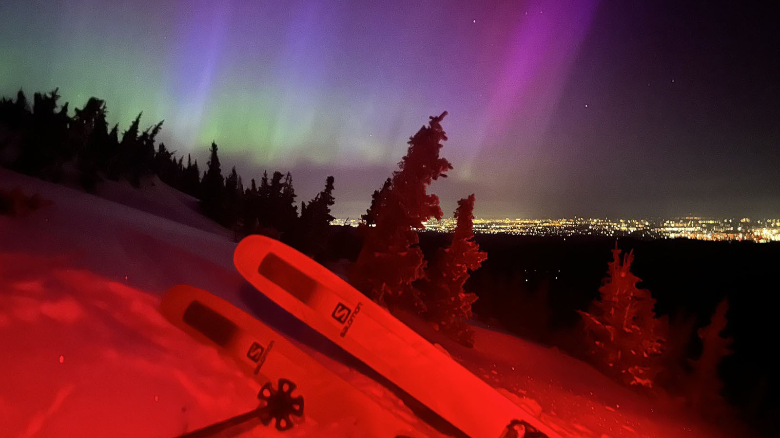 Charnick checks out the northern lights while taking a break from skiing on Friday night.
