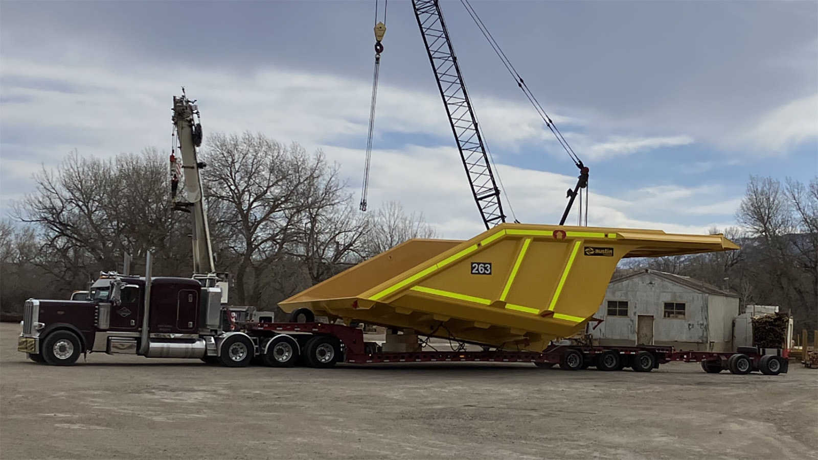 A truck at Austin Engineering USA in Mills prepares to head out with a delivery to a Wyoming mine.