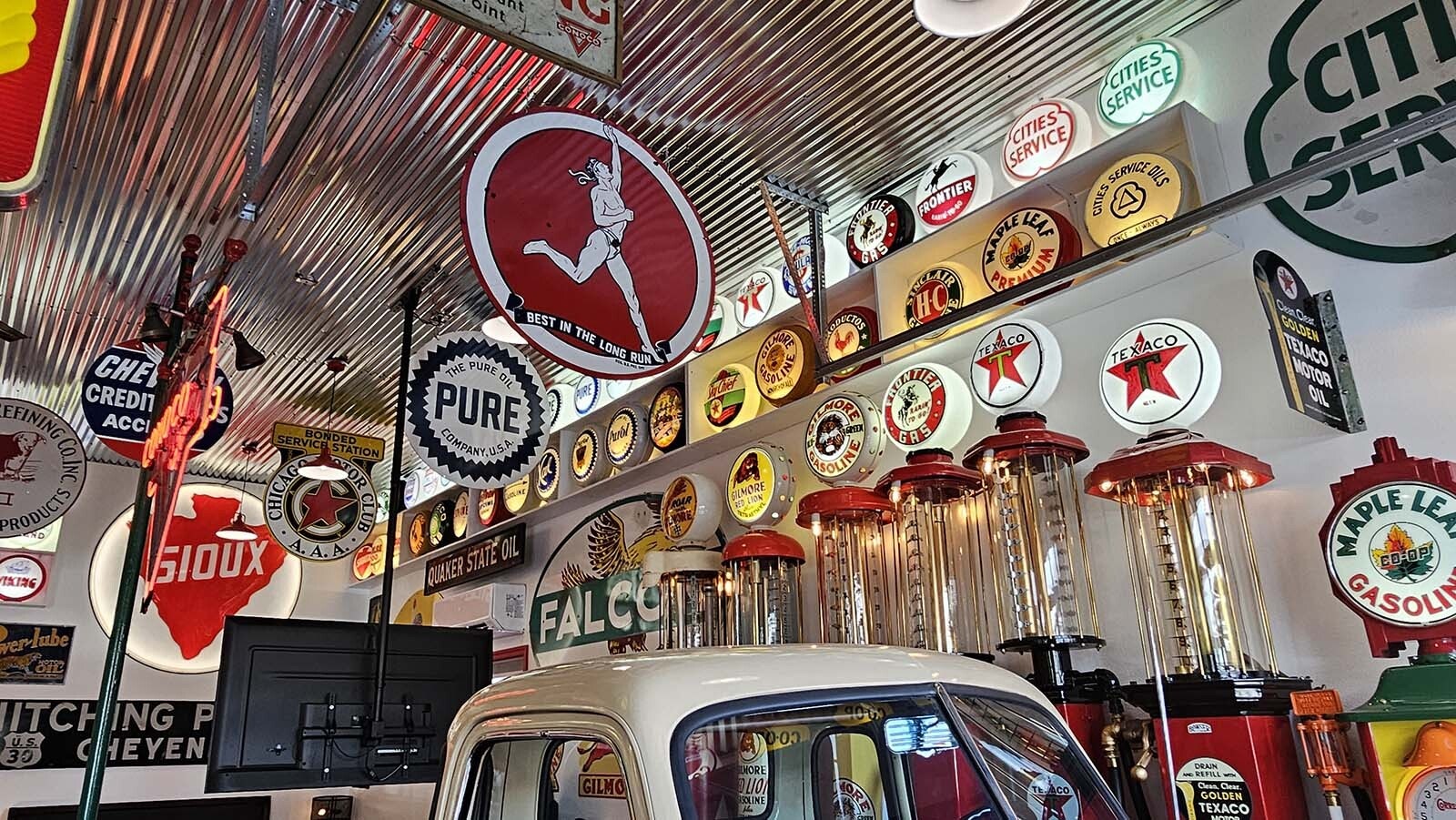 The other side of a vintage automobile-themed Airbnb in Gillette also has gas pumps and lighted neon globes as well as signs. The Airbnb was recently completed by Jeff Wandler who owns Frontier Auto Museum in Gillette.