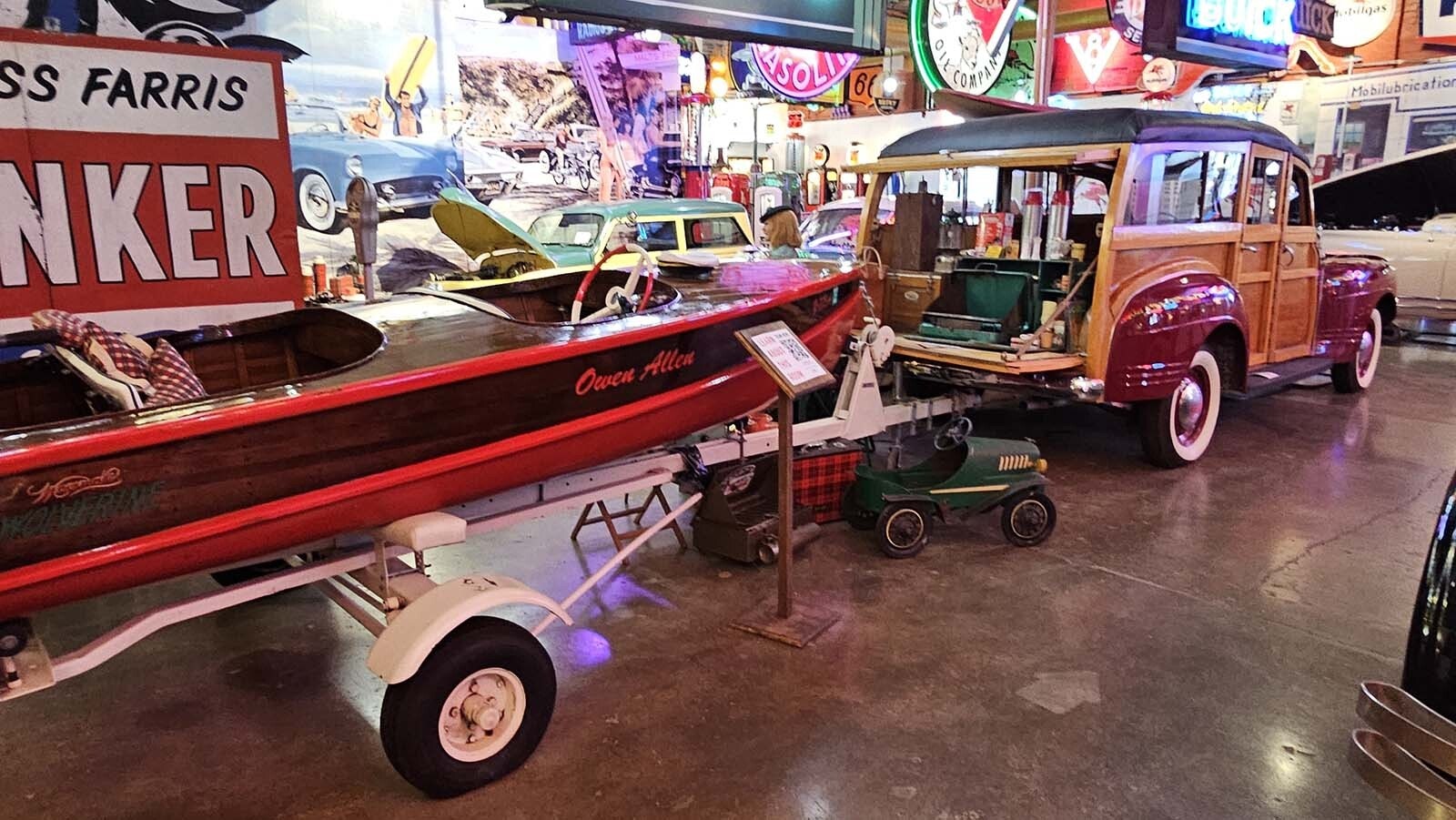 The scene inside the Frontier Auto Museum is a dizzying array of vintage automobile memorabilia, including the cars themselves, and all the accessories.