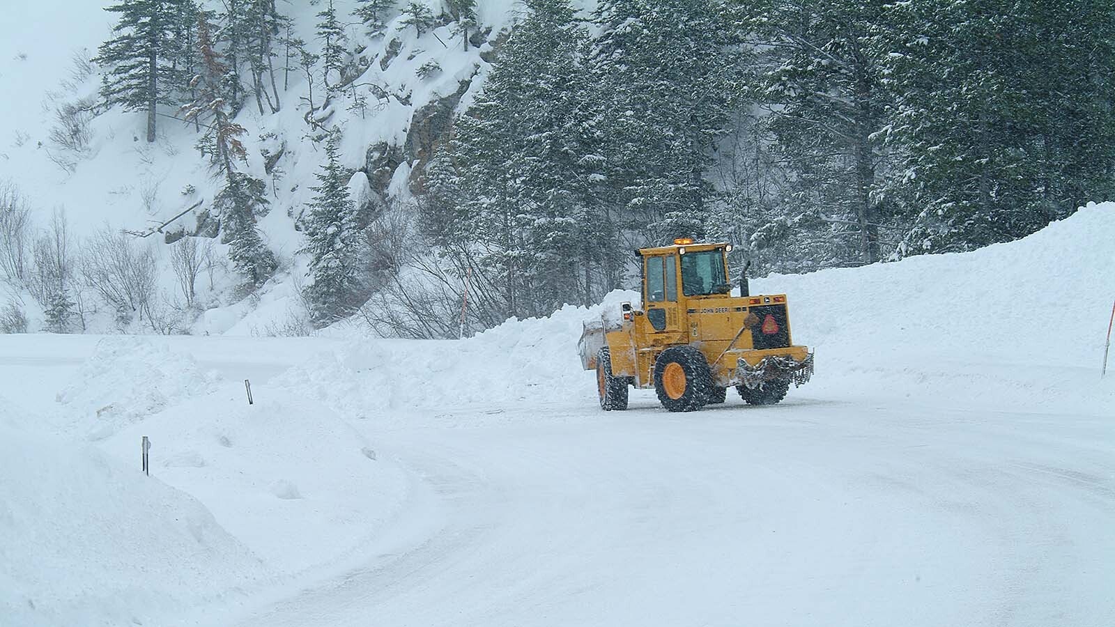 The infamous Hoback Canyon, where the Cow and Calf of the Woods avalanche chutes spill danger onto the highway below.