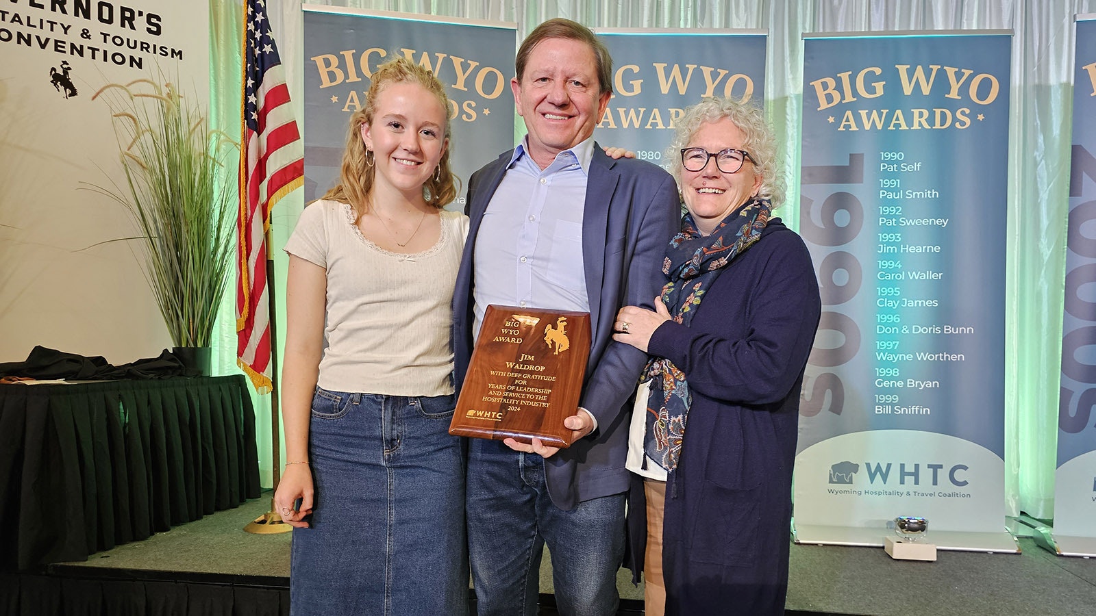 Jim Waldrop displays his BIG WYO Award with his wife, Charlotte, and daughter, Lucy.