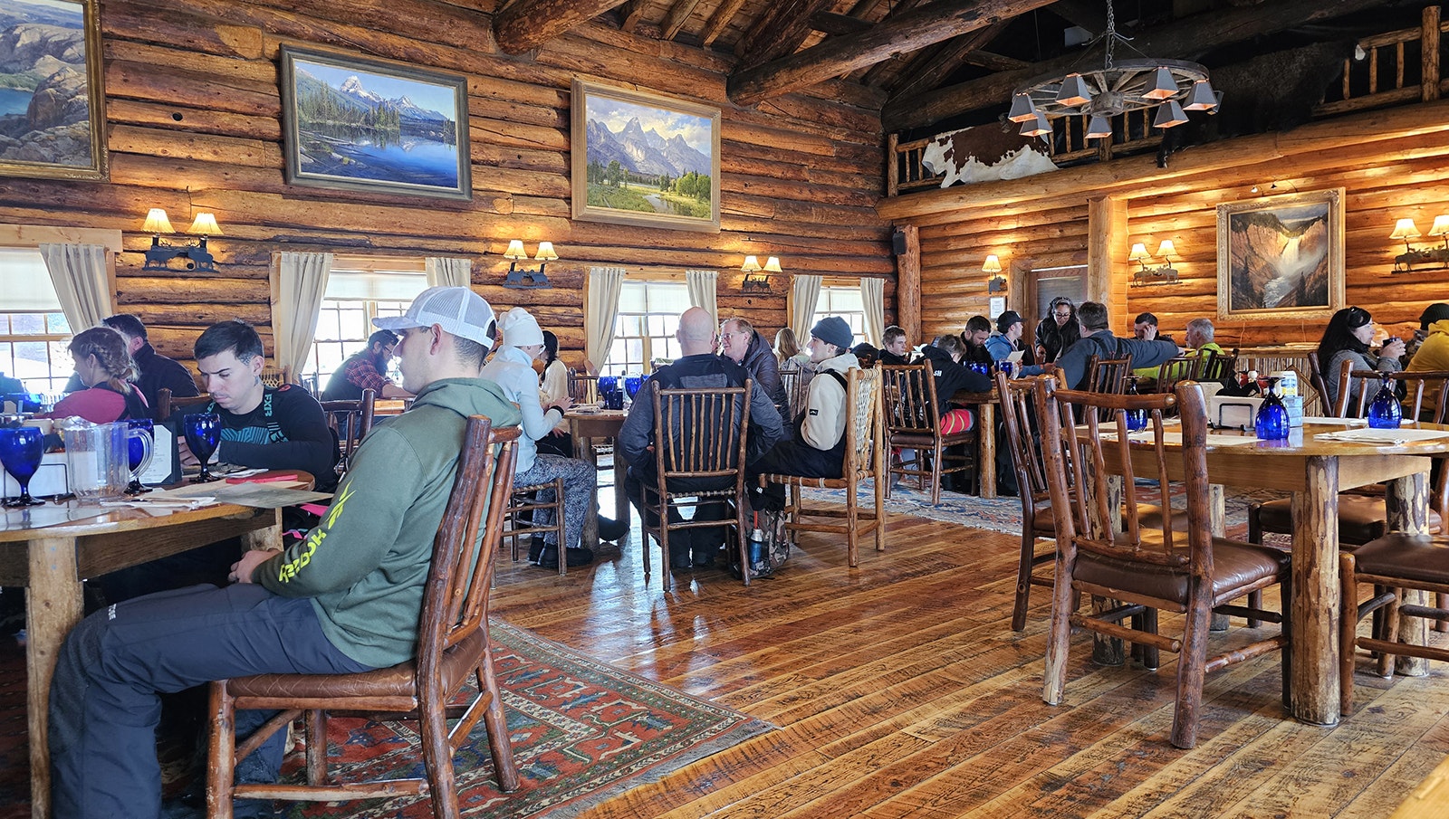 Mortimer the Moose's view of a busy dining hall on most any day during snowmobiling season at Brooks Lake Lodge.