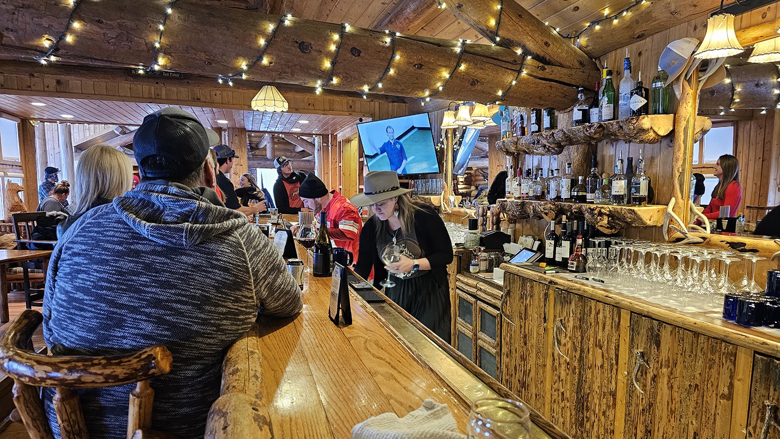 The bar is a popular gathering spot at Brooks Lake Lodge.