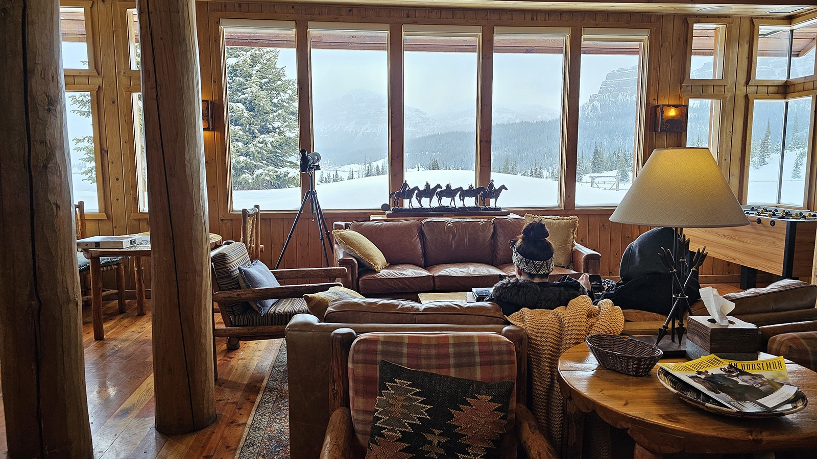 The lodge has many cozy nooks to sit and look outside at the view.