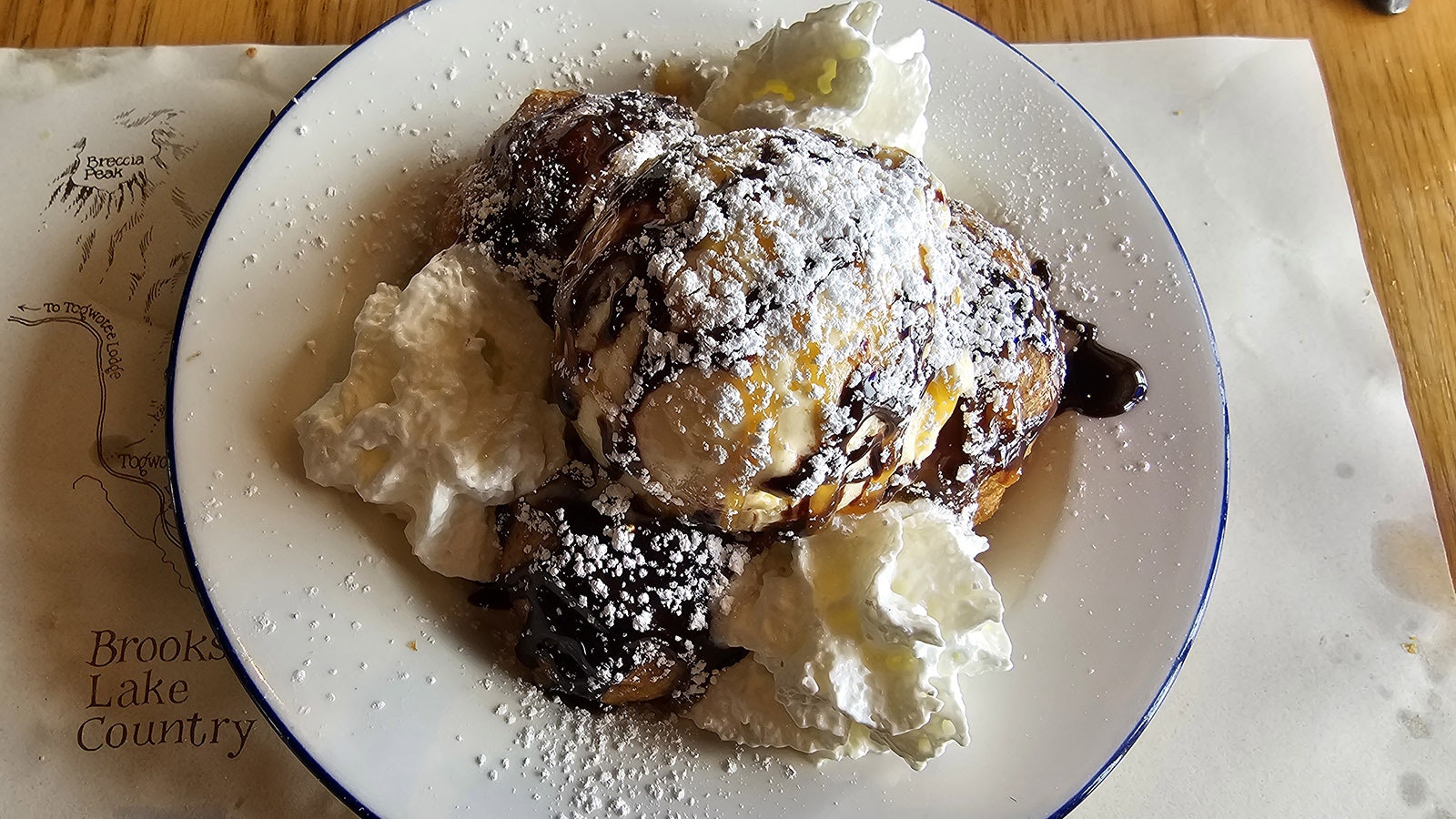 The fried cookie dough ice cream is another must for the winter menu. It's three balls of gooey chocolate chip cookie dough topped with ice cream, chocolate sauce, whipped cream and powdered sugar.