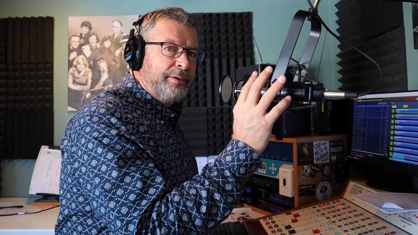 Former Denver radio host, and Wyoming native, John Baggett at a microphone.