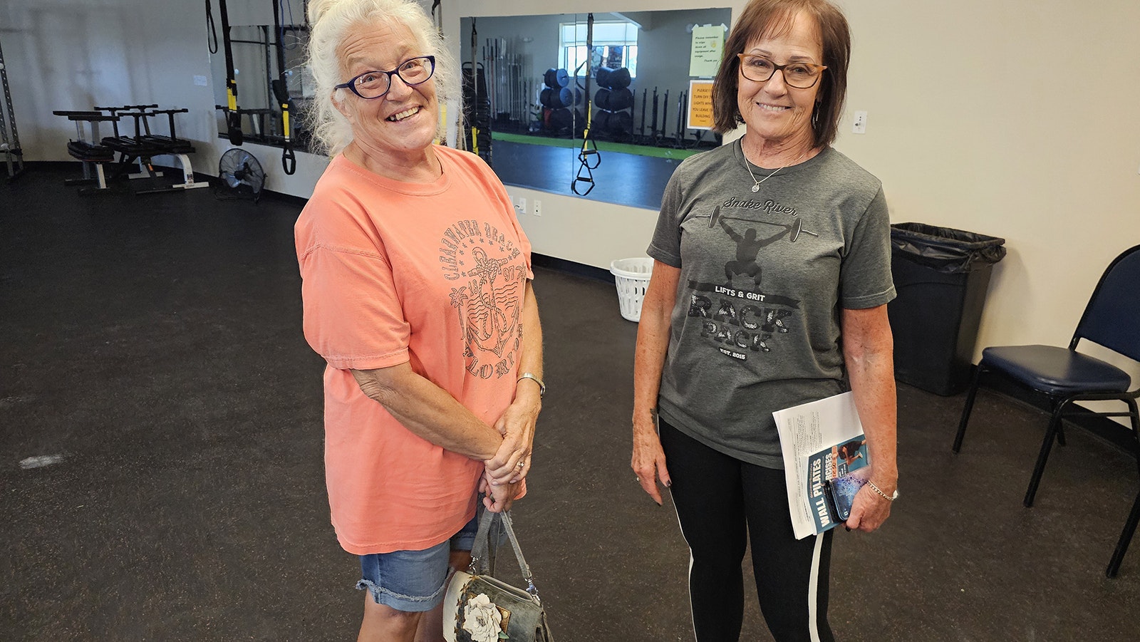 Sharyn Simonetti talks with Cathy Terkla, who teaches a chair Pilates class at the Valley Community Center in Baggs.