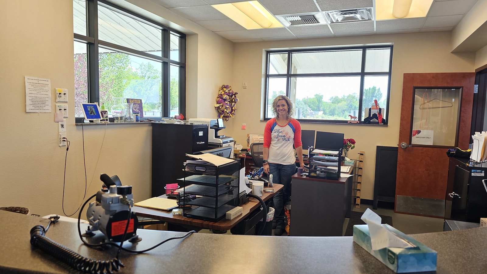 Manager of the Valley Community Center Celia Weber works the front desk, but also teaches a TRX class.