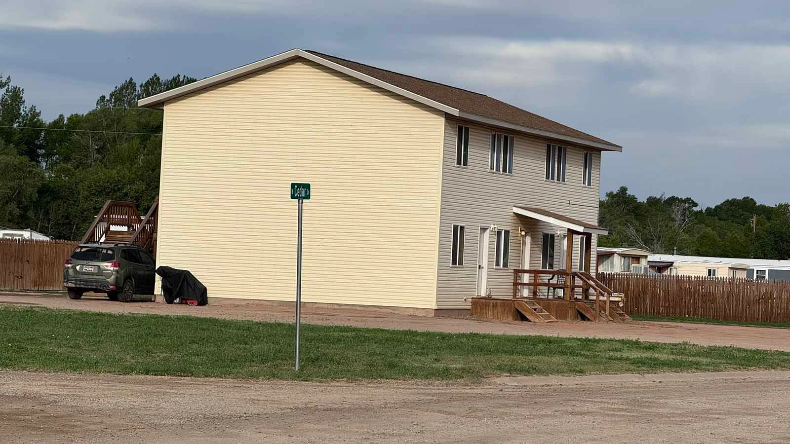 It was hard to tell Tuesday morning that just eight hours earlier, this apartment building was a major crime scene.