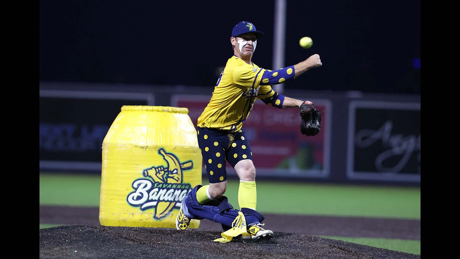 Mat Wolf of the Savannah Bananas pitches during a game against the Party Animals at Richmond County Bank Ball Park in New York City.