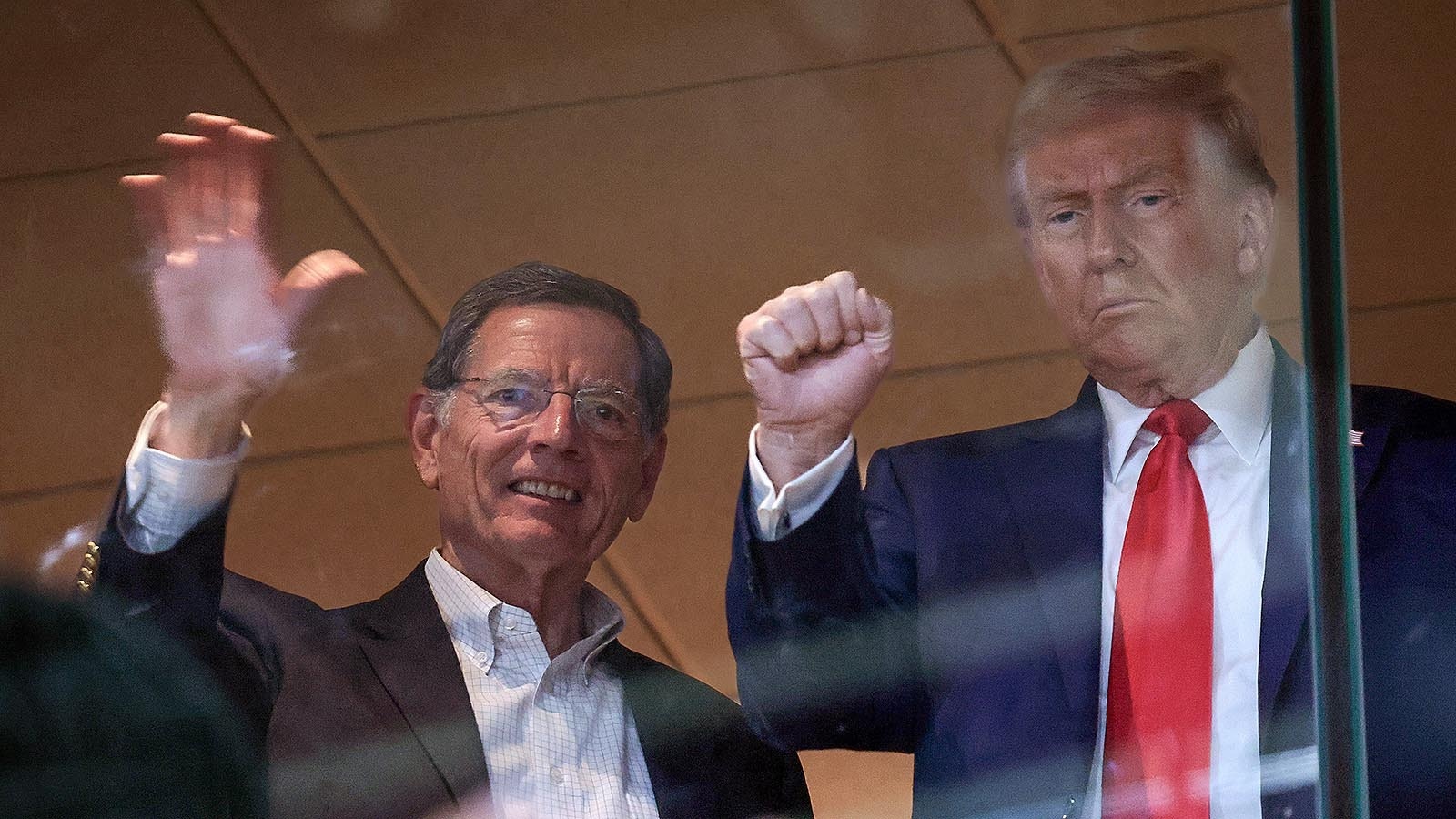 U.S. Sen. John Barrasso, left, with former President Donald Trump at a Pittsburgh Steelers football game on Oct. 20, 2024. New polls show both remain as popular as ever with Wyoming voters days before the Nov. 5, 2024, general election.