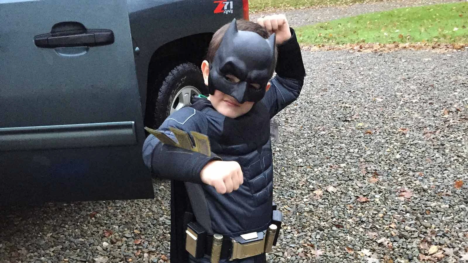 Issac Sweitzer wearing his Batman costume.