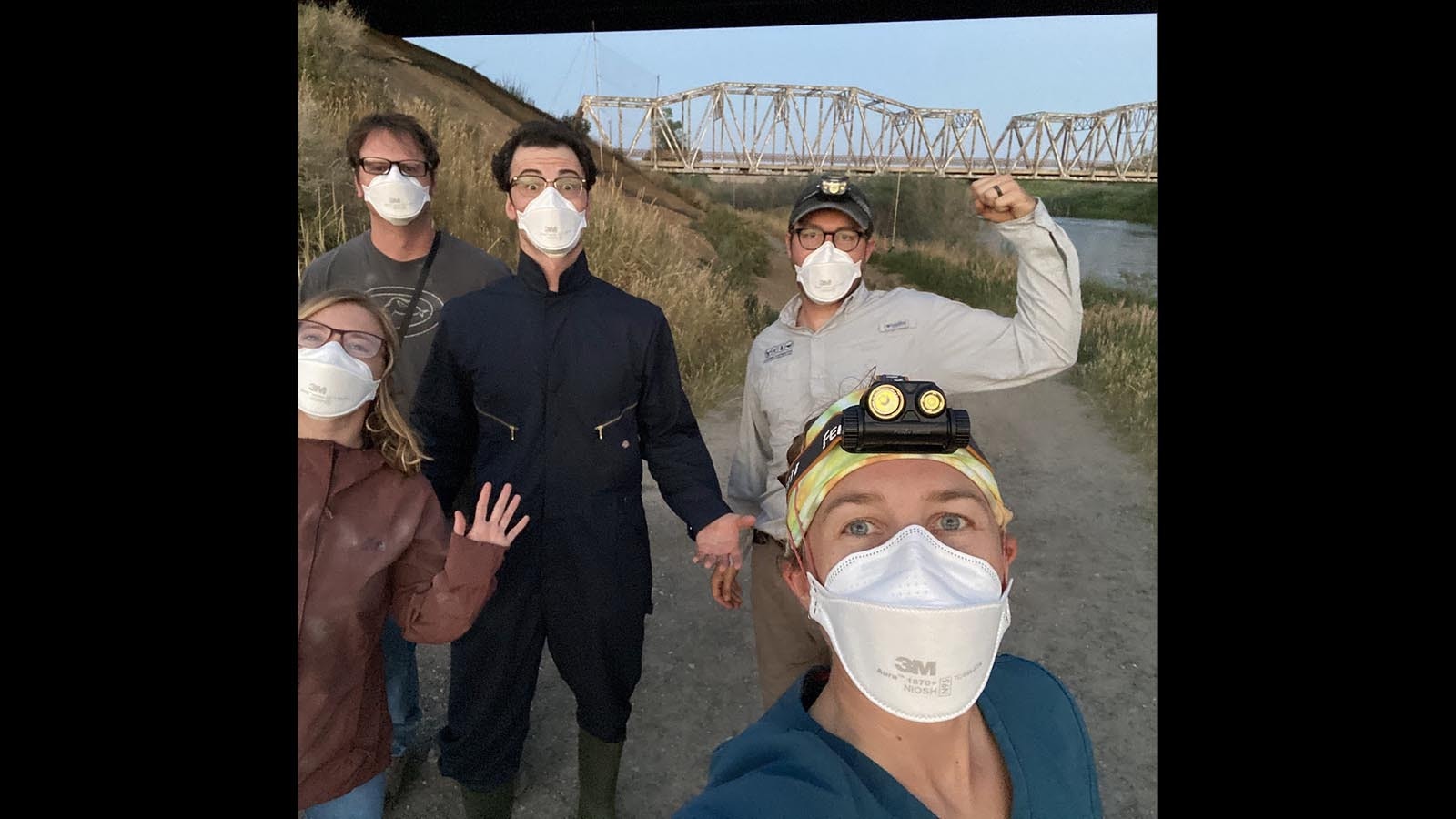 University of Wyoming Assistant Professor Riley Bernard with some of her lab team netting bats under bridges.