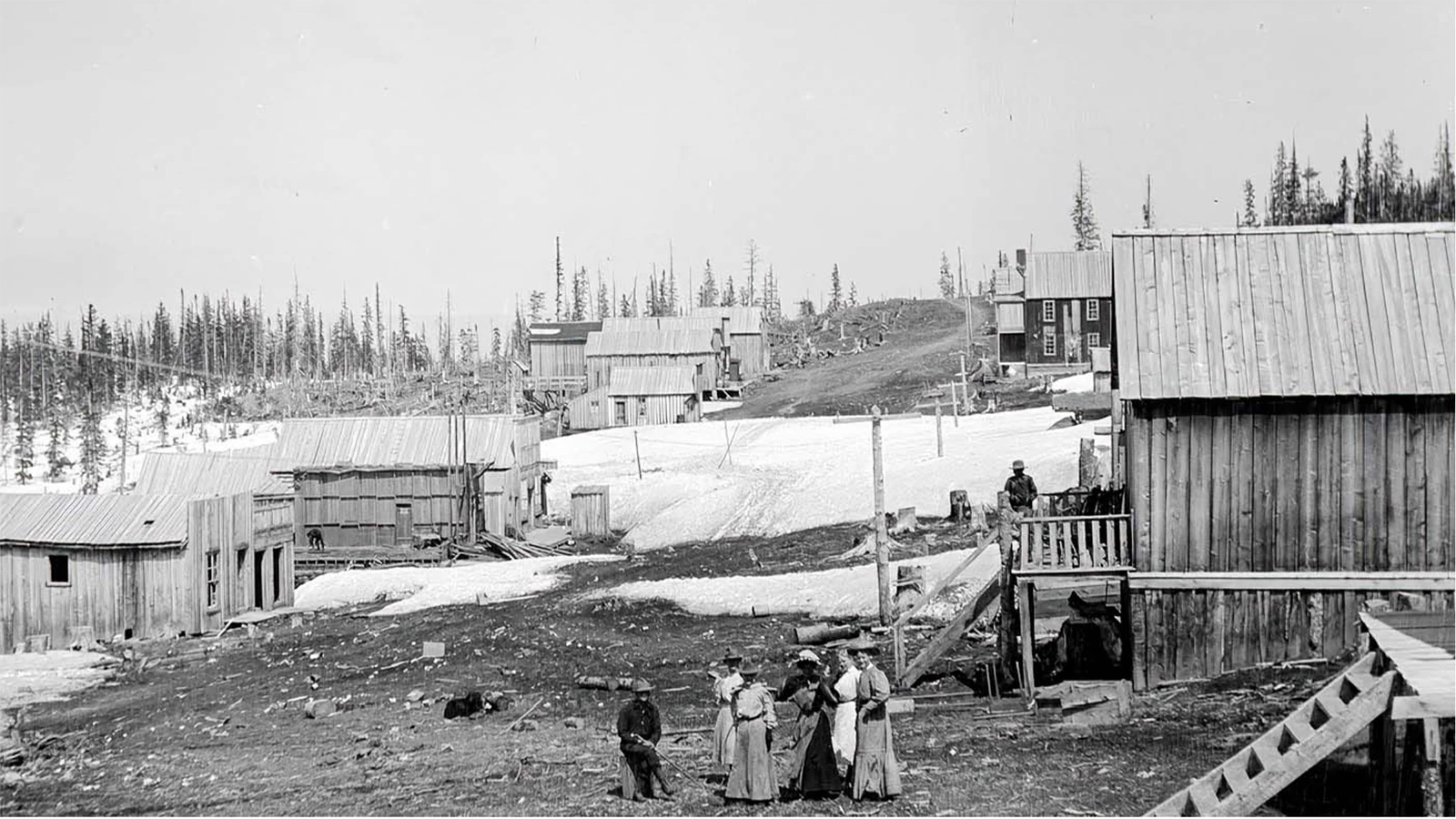 In 1903, Battle was a lively mining town in the Sierra Madres of Wyoming near Encampment. Snow remained in this isolated hamlet until June and the miners and sheepherders of the region found their entertainment in the saloons and brothels. There was also plenty of shopping in Battle and even a schoolhouse for the children.