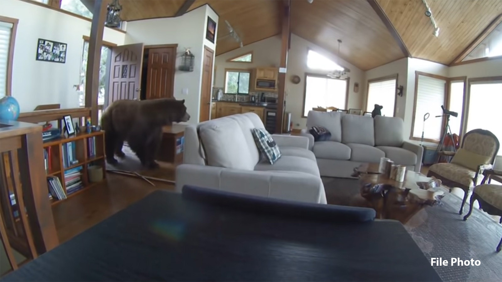 It's unusual, but not unheard of, for bears to break into homes while looking for food, as in this file photo from a video of a bear break-in a few years ago.