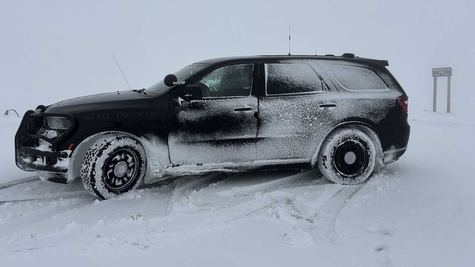 The Wyoming Department of Transportation is working Monday to clear 3-foot snowdrifts off the Beartooth Highway after a blast of mid-June winter blew through Wyoming over the weekend. Other parts of the state saw record-low temperatures.