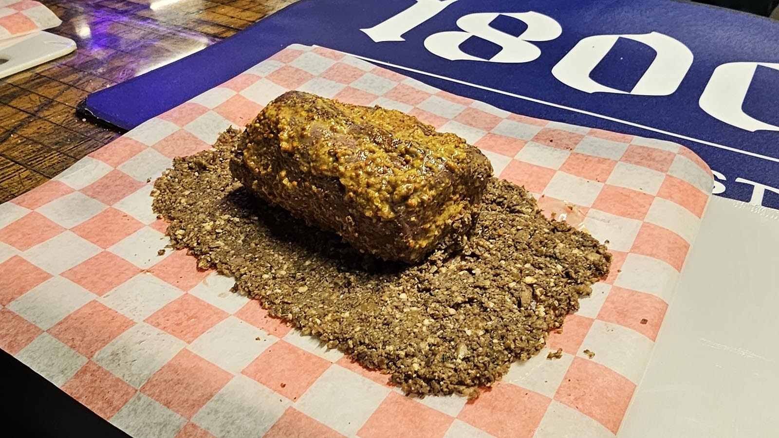 That's a wrap! The beef tenderloin sits in the center of prosciutto and mushroom duxelles prior to wrapping.