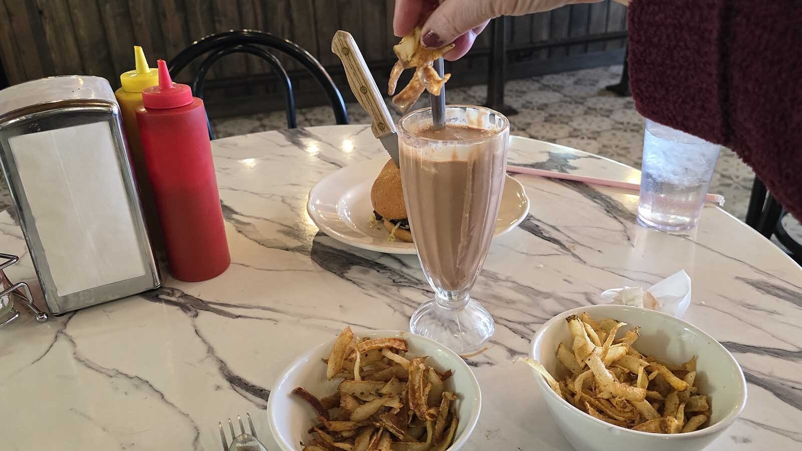 French fries turn out to be quite delicious dipped in a chocolate malt. That's something this reporter had never heard of before, but it is a secret menu item in Chugwater at the Soda Fountain.
