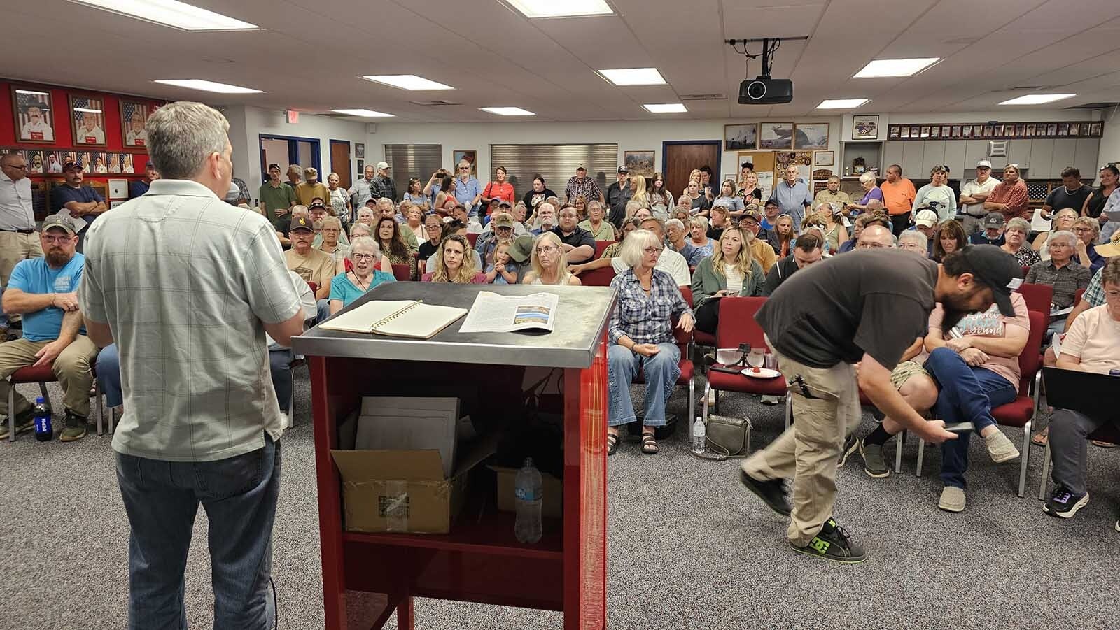 Mark Begich speaks to a standing room-only crowd at the Thermopolis Volunteer Fire Hall Monday night.