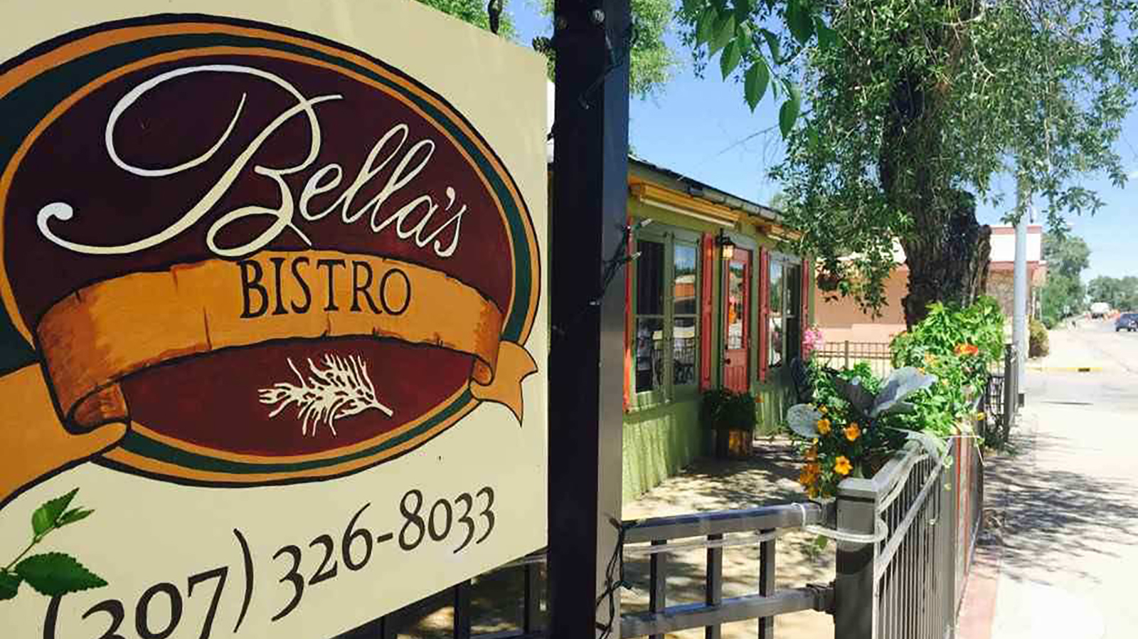Bellas in the summer has ann outdoor patio dining area