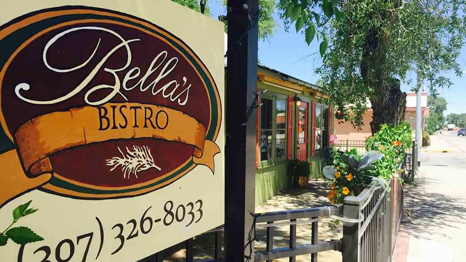 Bellas in the summer has ann outdoor patio dining area