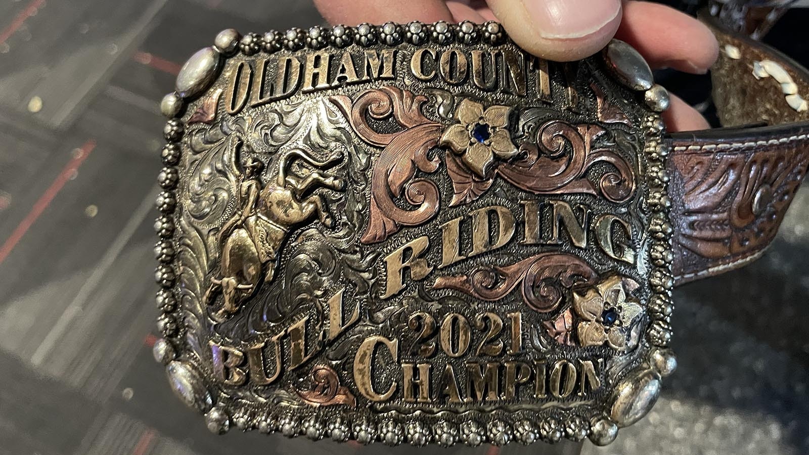 Rodeo diehards flock to Las Vegas for the National Finals Rodeo, where belt buckles symbolize pain, pride and a way of life. Western culture is more than a trend for riders and fans, it’s an identity. And when it comes to buckles, go big or go home.