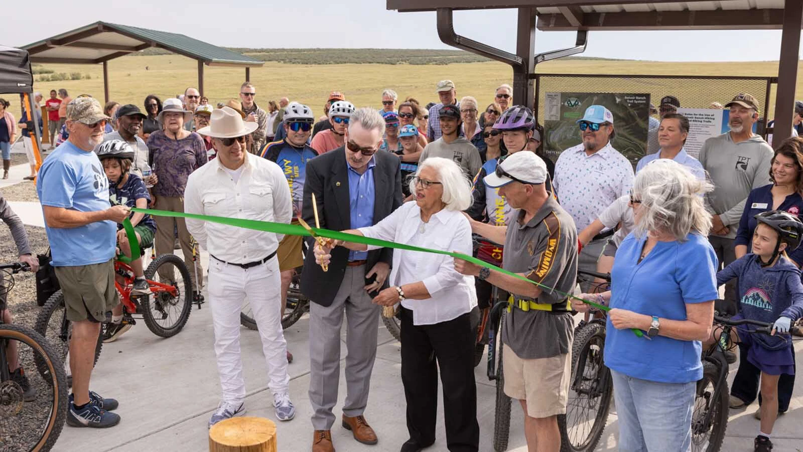 Mary Roybal, mother for the late Councilman Scott Roybal, cuts the ribbon to open the Belvoir Ranch to the public on Wednesday, July 1, 2026.
