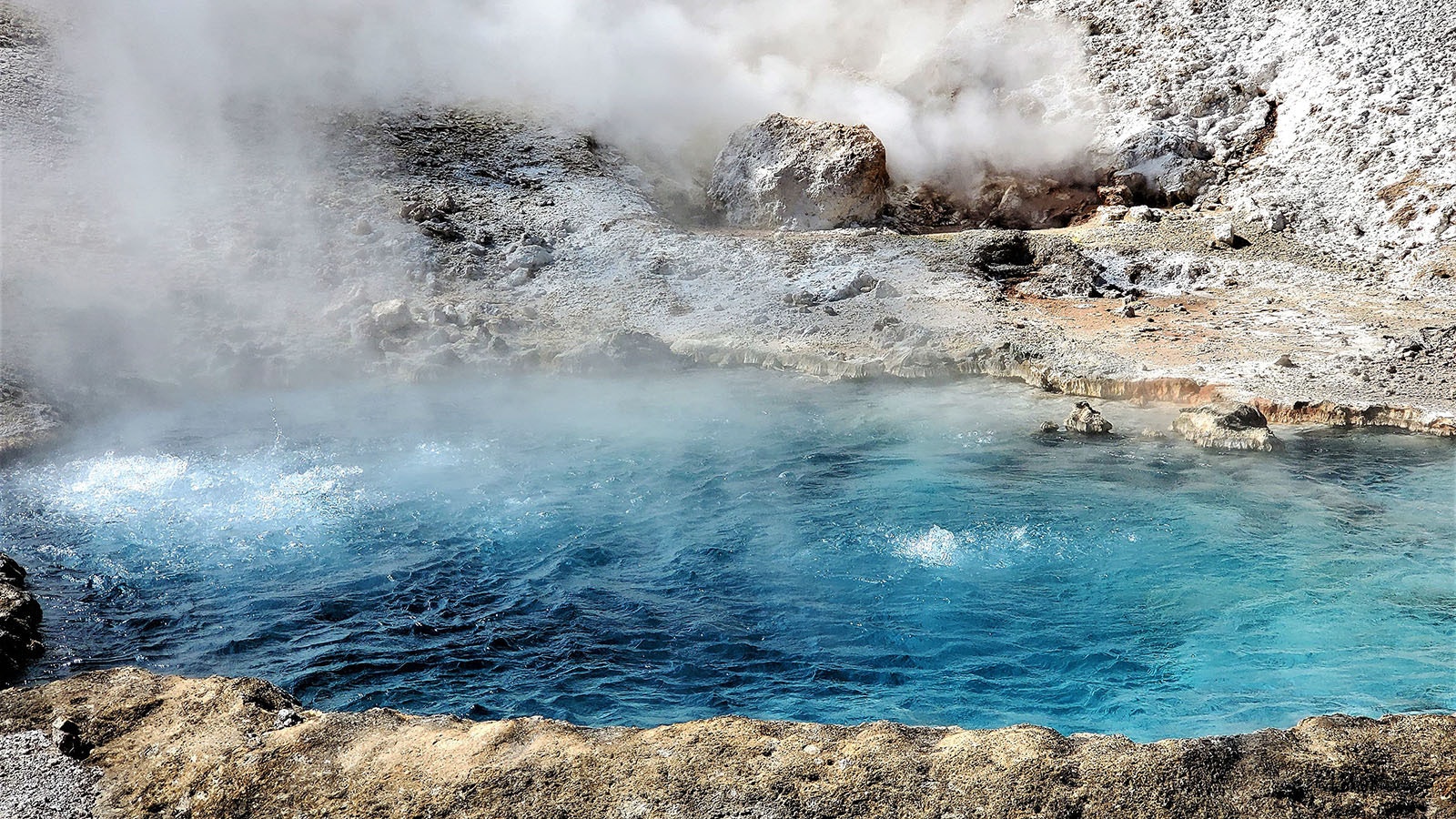 Beryl Spring, located between Mammoth Hot Springs and Madison Junction, was named for the color of its boiling water, which has been a source of intrigue, frustration, and destruction since the beginning of Yellowstone National Park.