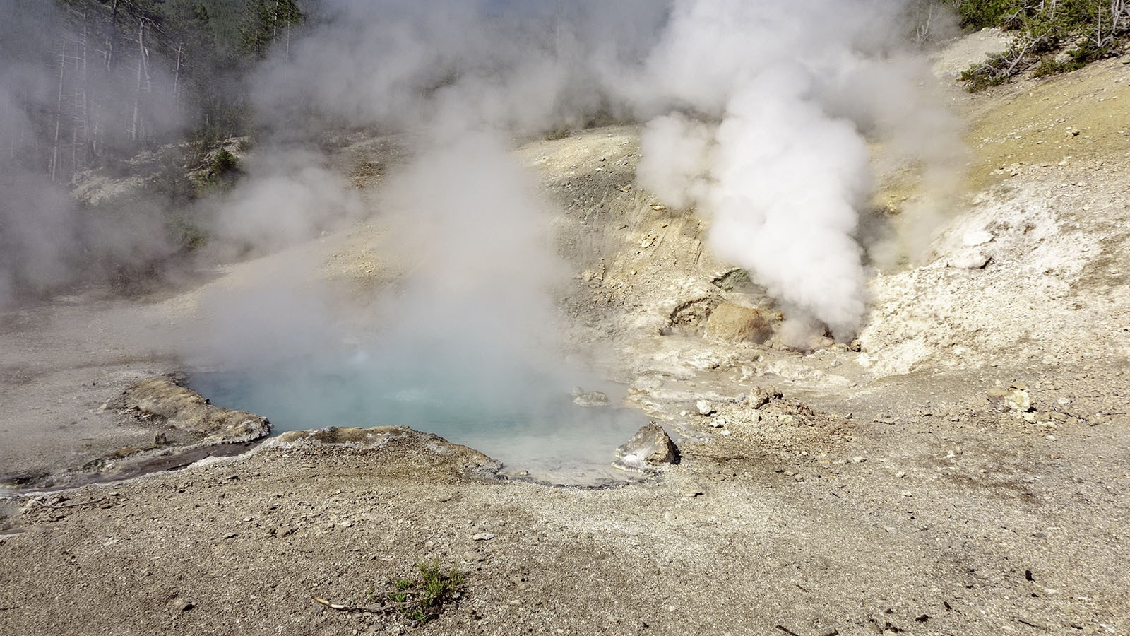 The blue water in Beryl Spring in Yellowstone National Park.