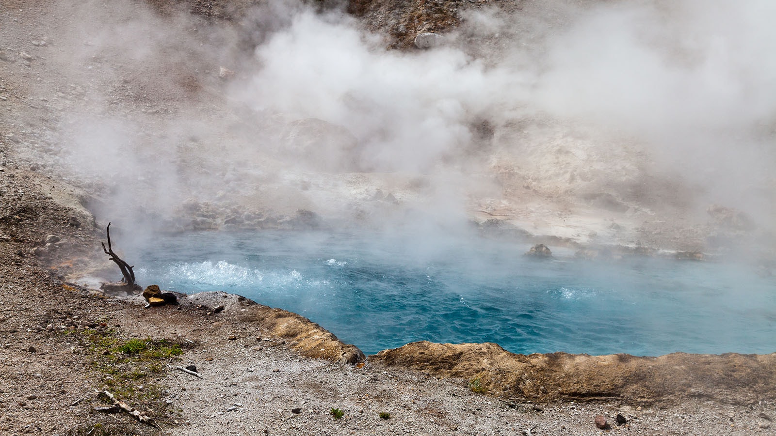 The blue water in Beryl Spring in Yellowstone National Park.