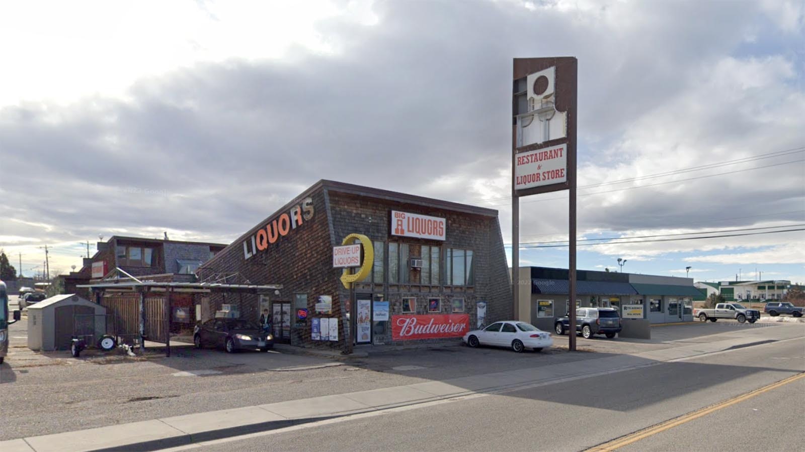 Wheatland police are tight-lipped about what happened inside a vacant liquor store there overnight Saturday. One person was taken to the hospital, and another was hospitalized briefly then charged with burglary and taken to jail.