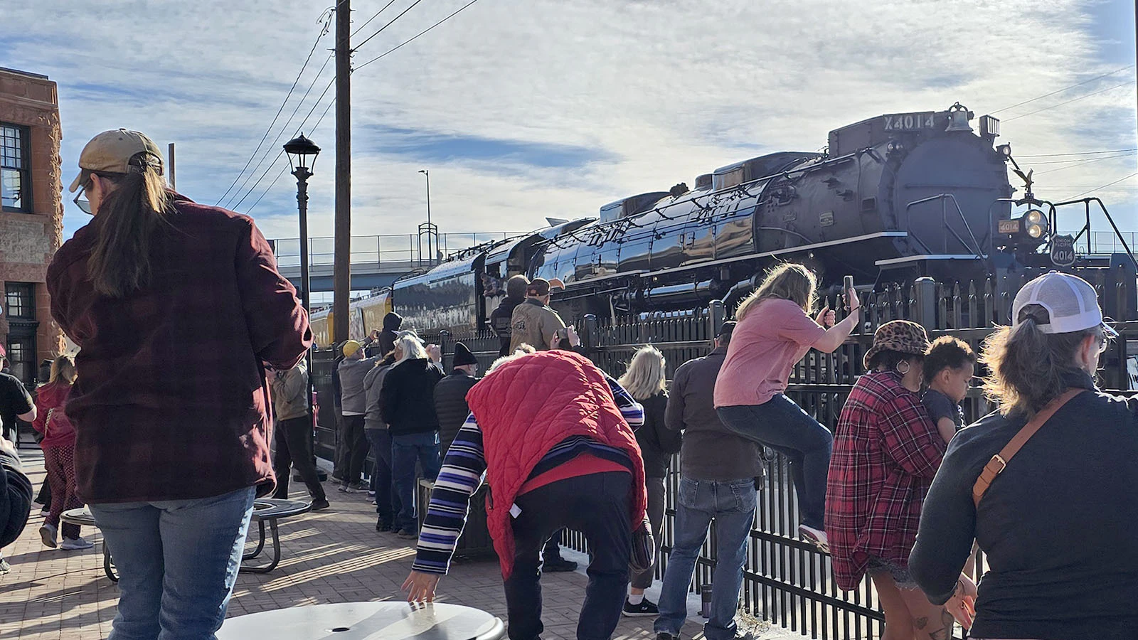 People stood up on tables and tiptoes to film Big Boy's departure from Cheyenne on its America 250 tour. This year, Big Boy will make a coast-to-coast journey, returning to the East Coast for the first time in its history.